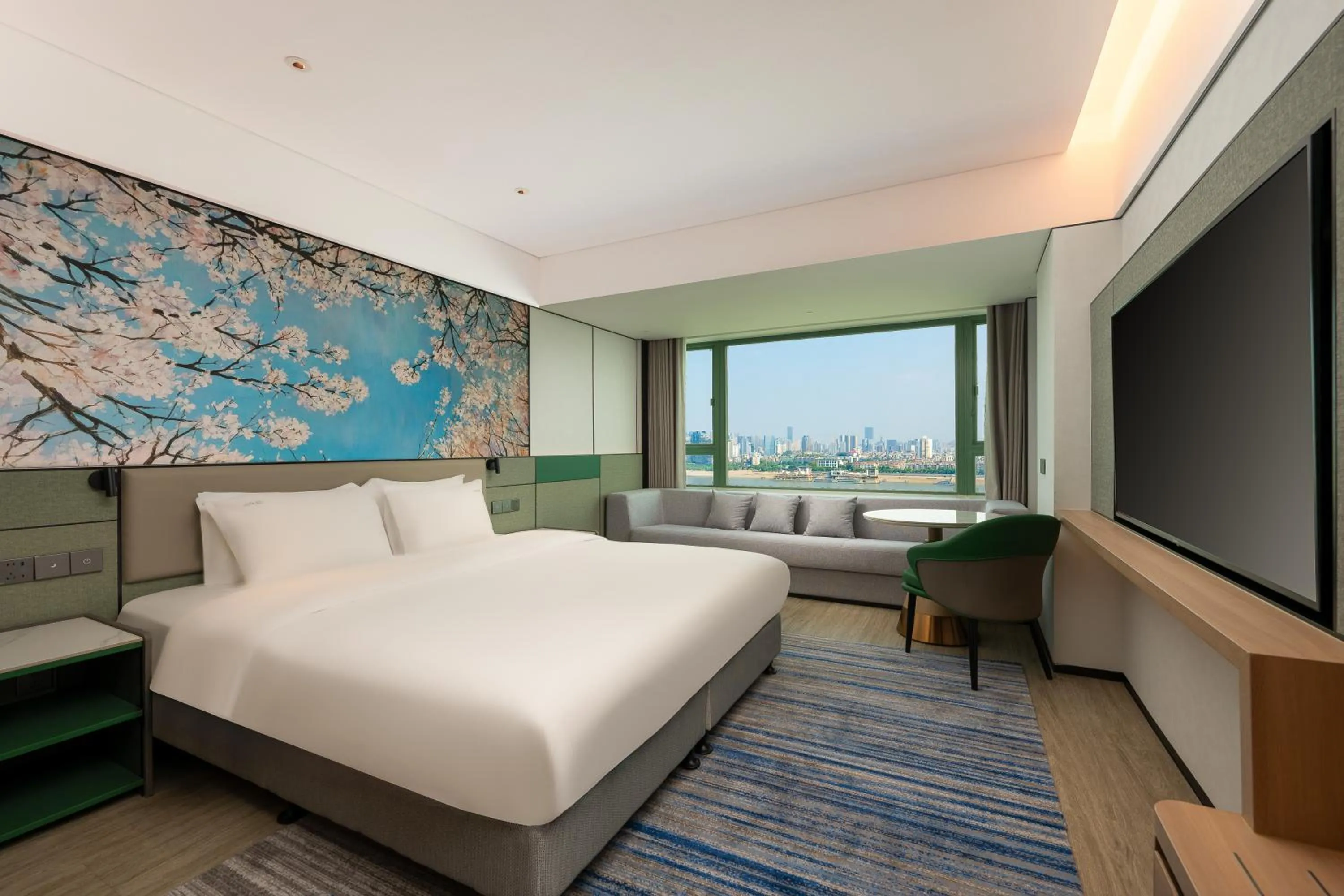 Bed in Holiday Inn Wuhan Riverside by IHG