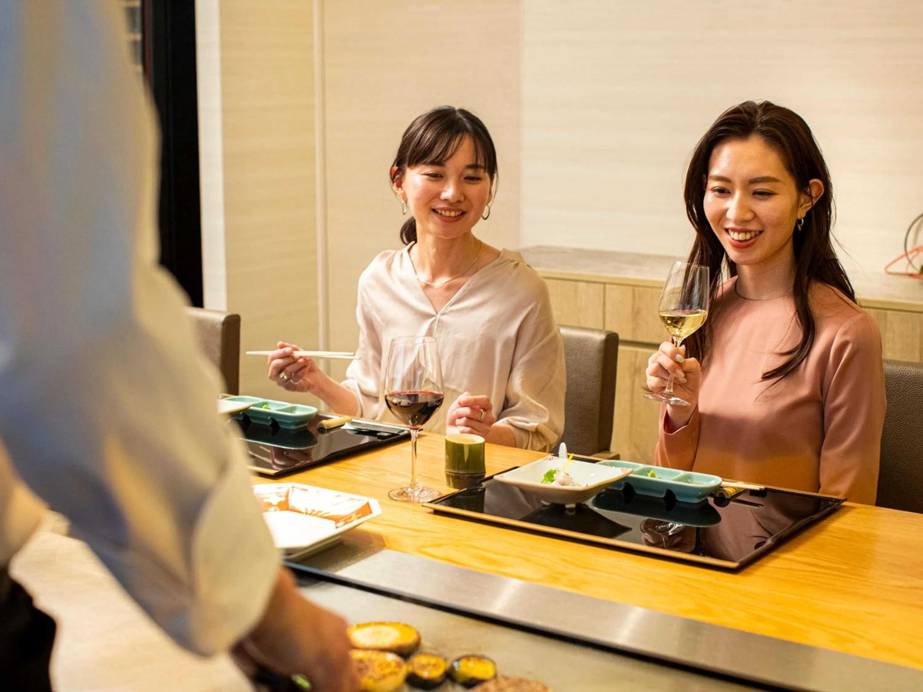 People in Garden Terrace Saga Hotel & Resorts