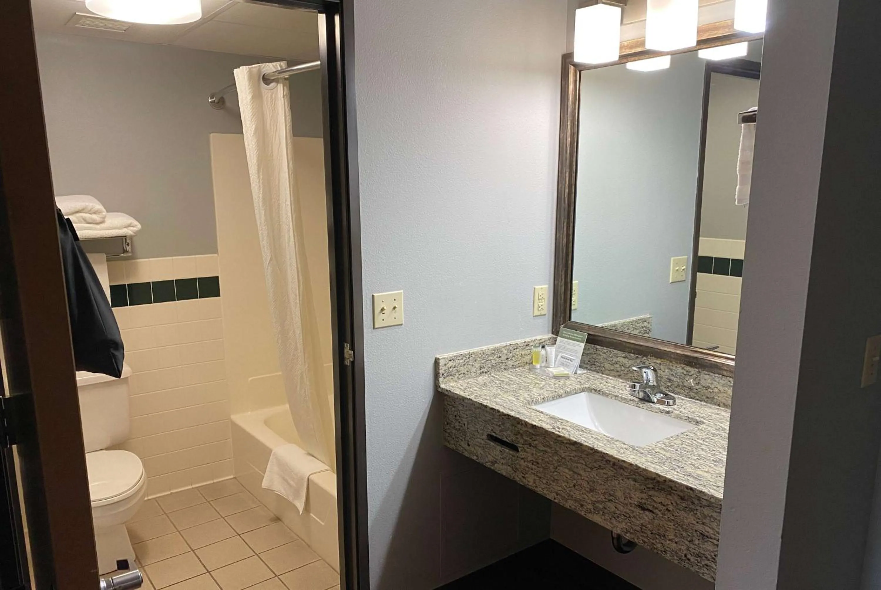 Bathroom in AmericInn by Wyndham Chanhassen