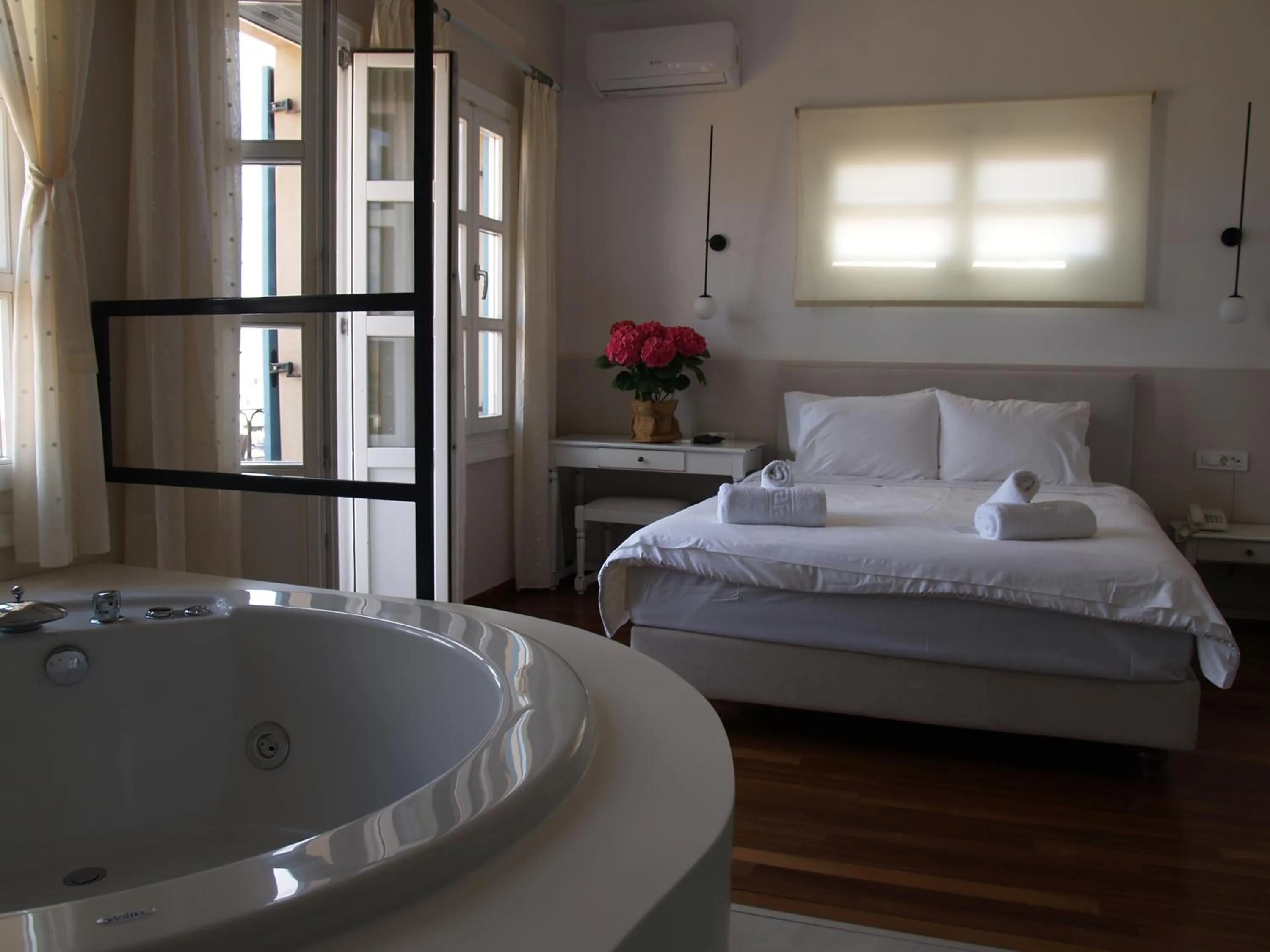 Bed in Hotel Amphora