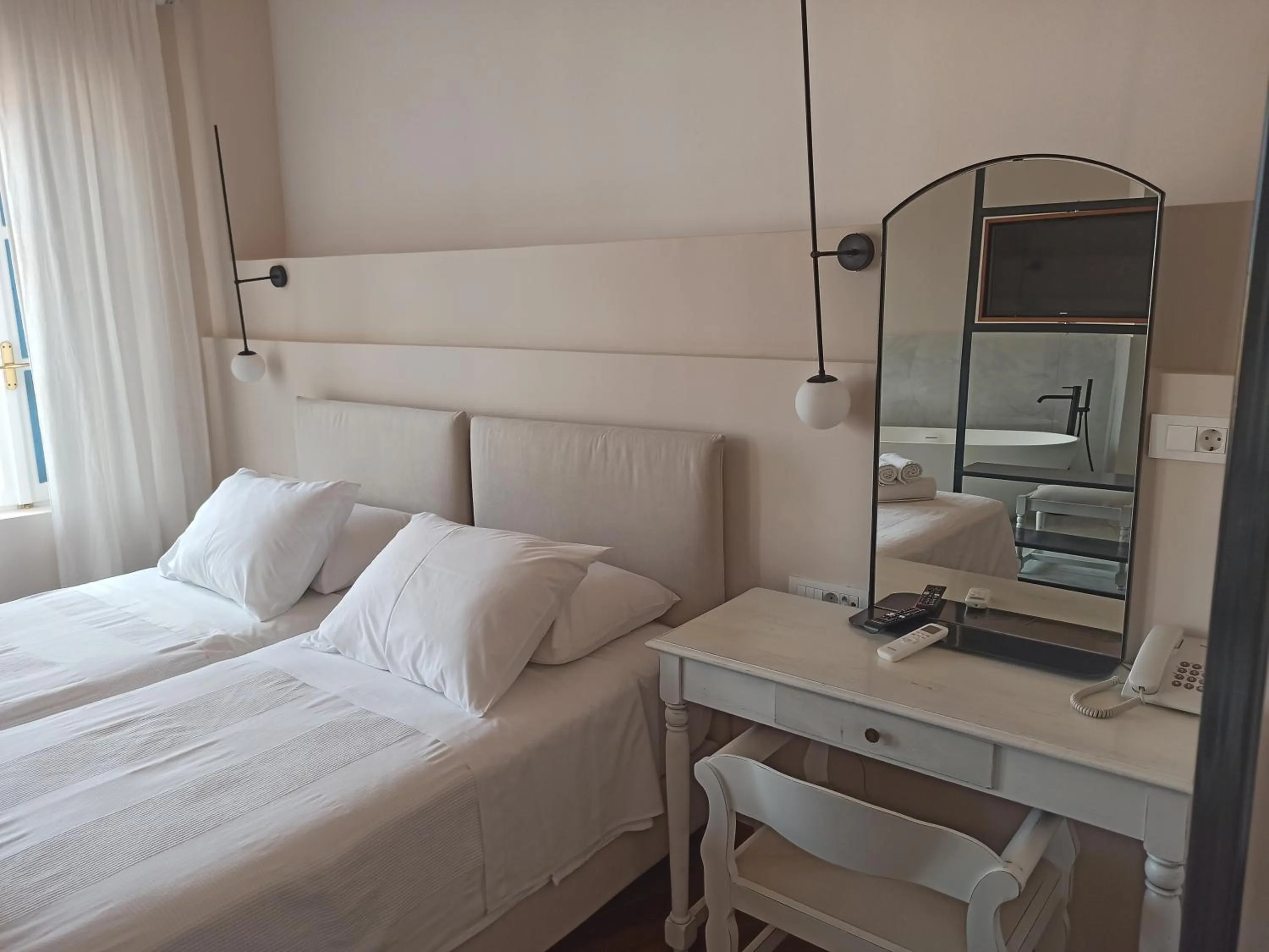 Bed in Hotel Amphora