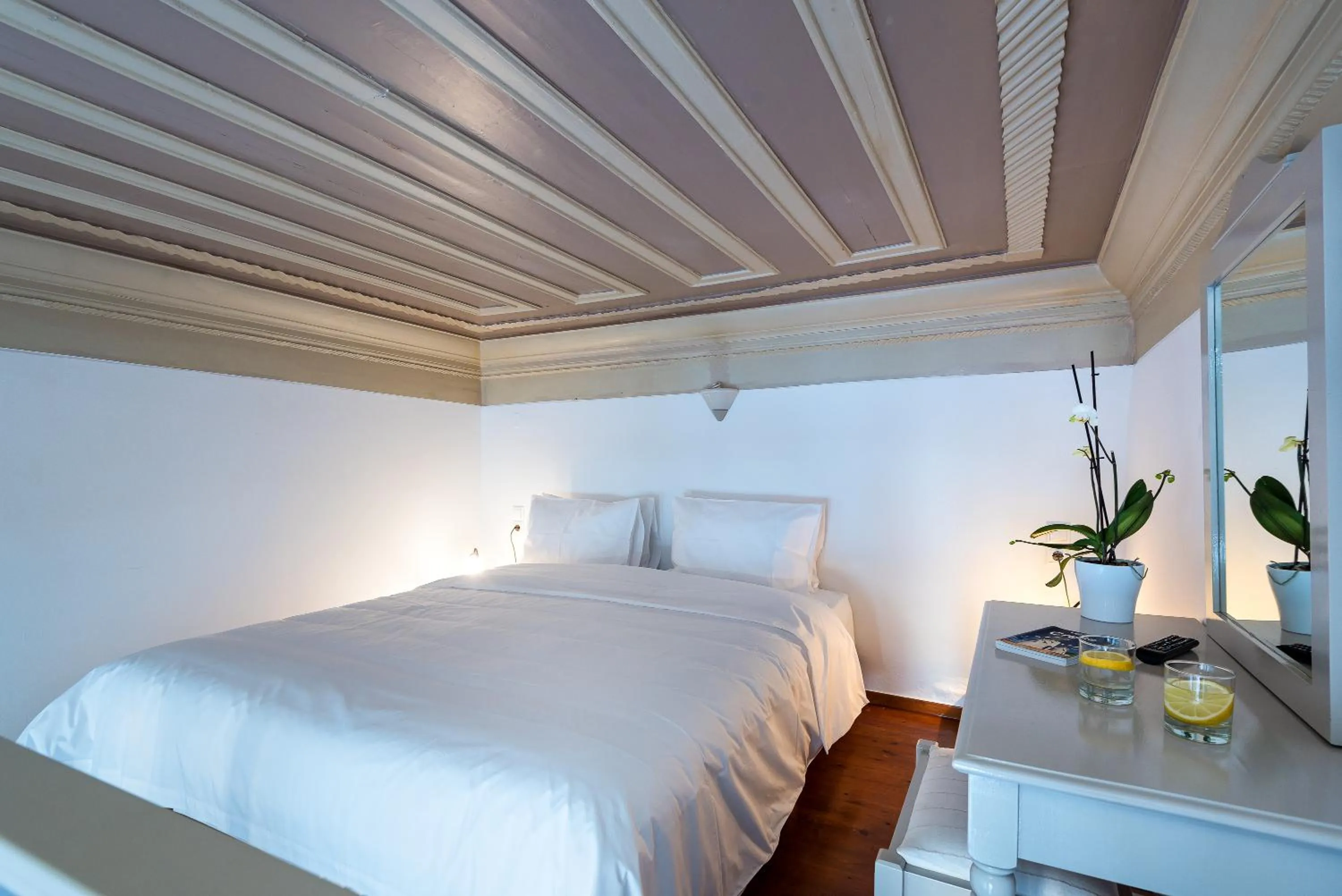 Bed in Hotel Amphora