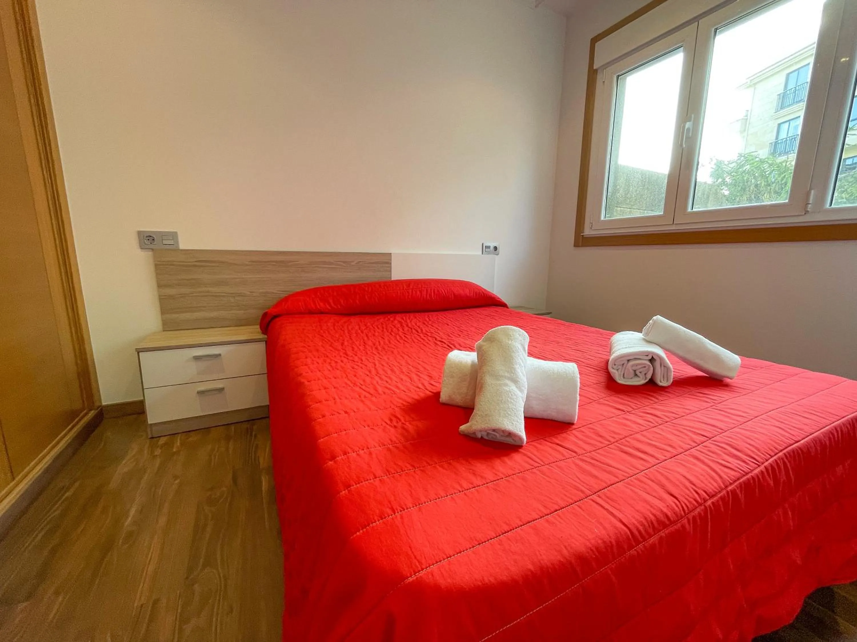 Bed in Apartamentos Revolta Sanxenxo 3000