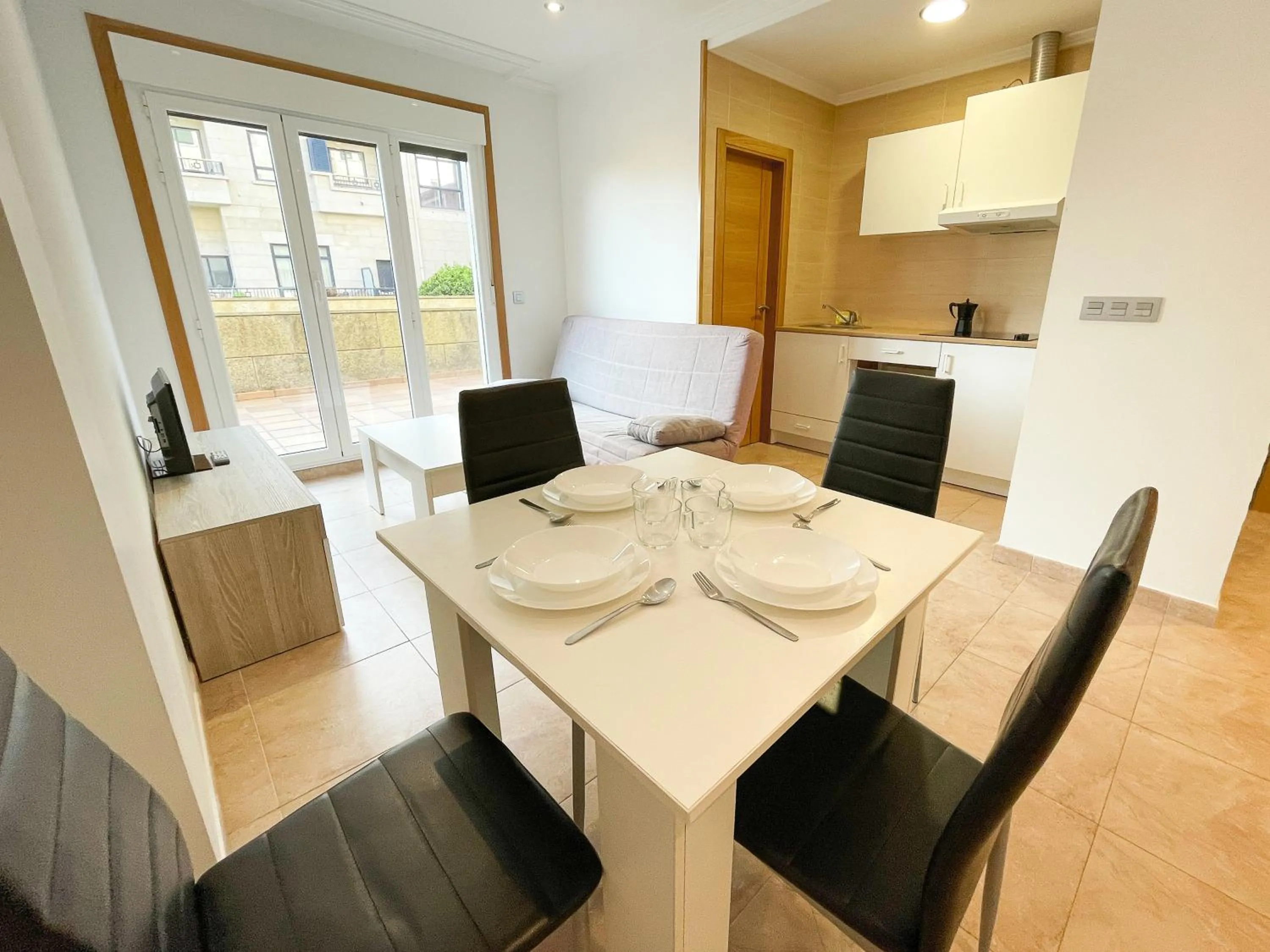 Kitchen or kitchenette in Apartamentos Revolta Sanxenxo 3000