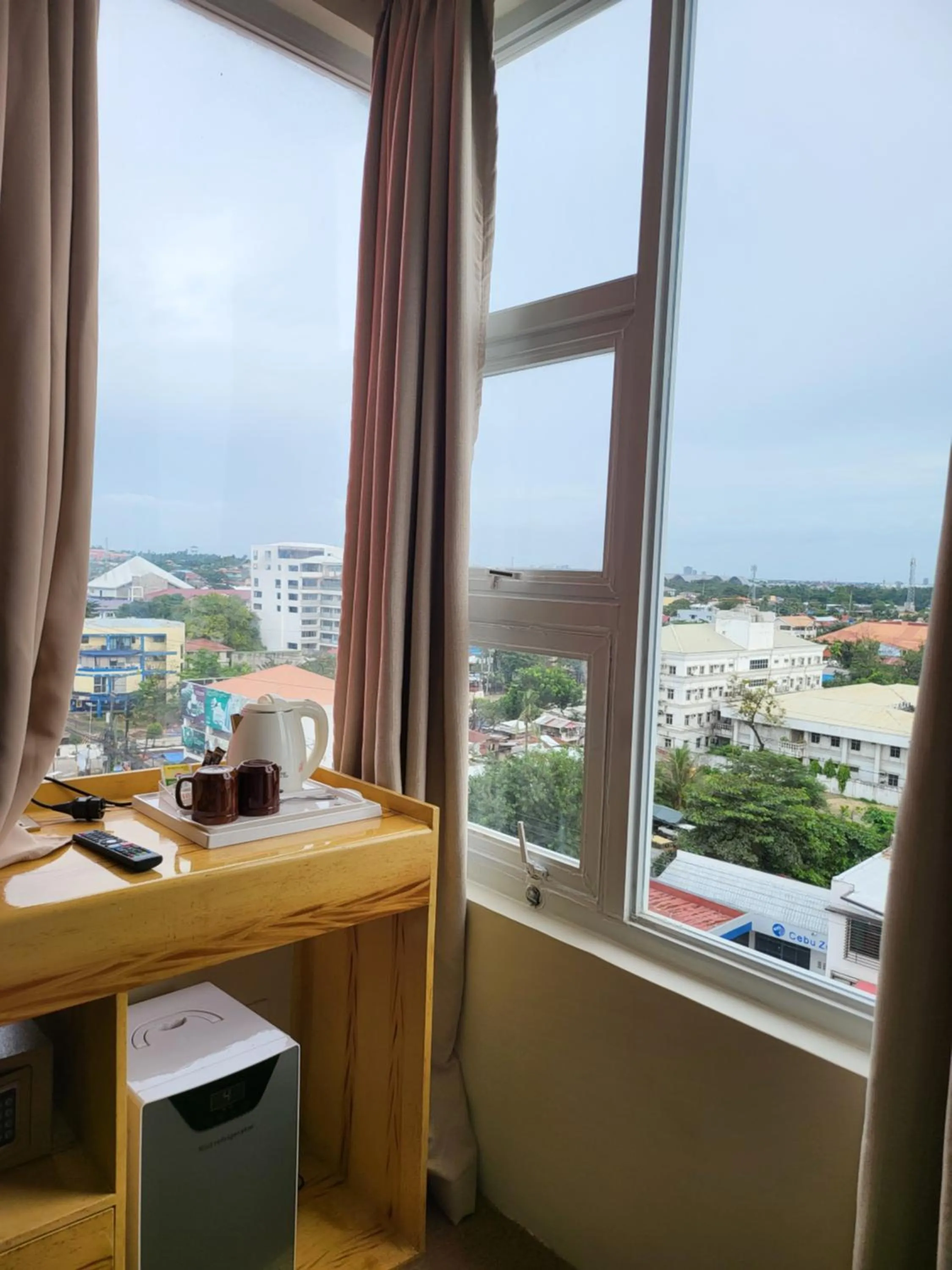 City view in Sempre Premier Inn - MACTAN AIRPORT HOTEL