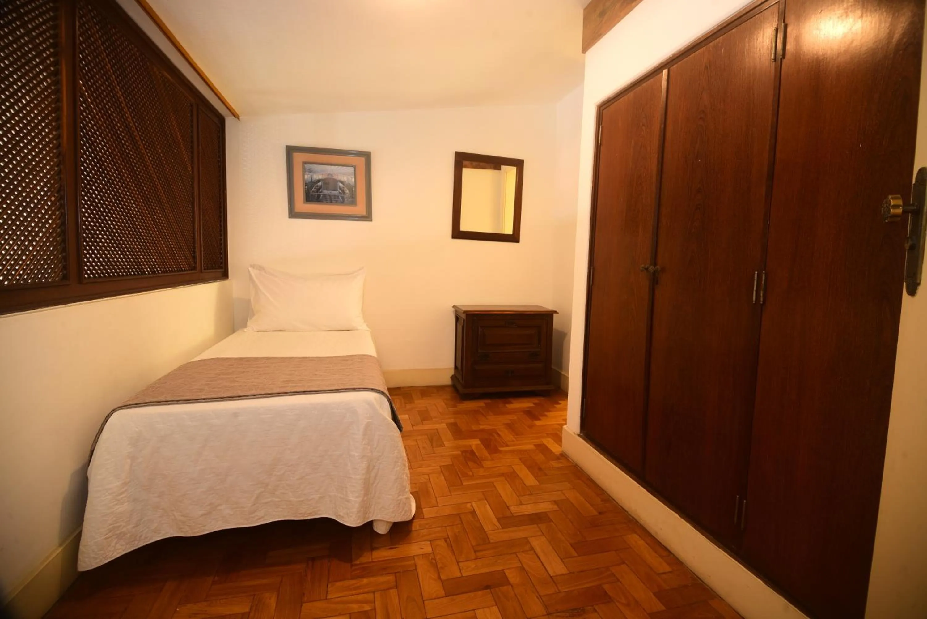 Bed in Grande Hotel de Ouro Preto - 80 ANOS