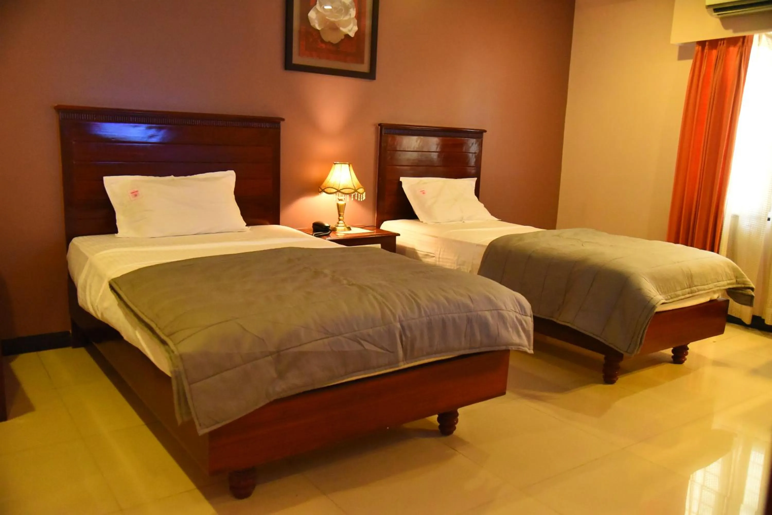 Bed in Hotel Subhalakshmi Palace