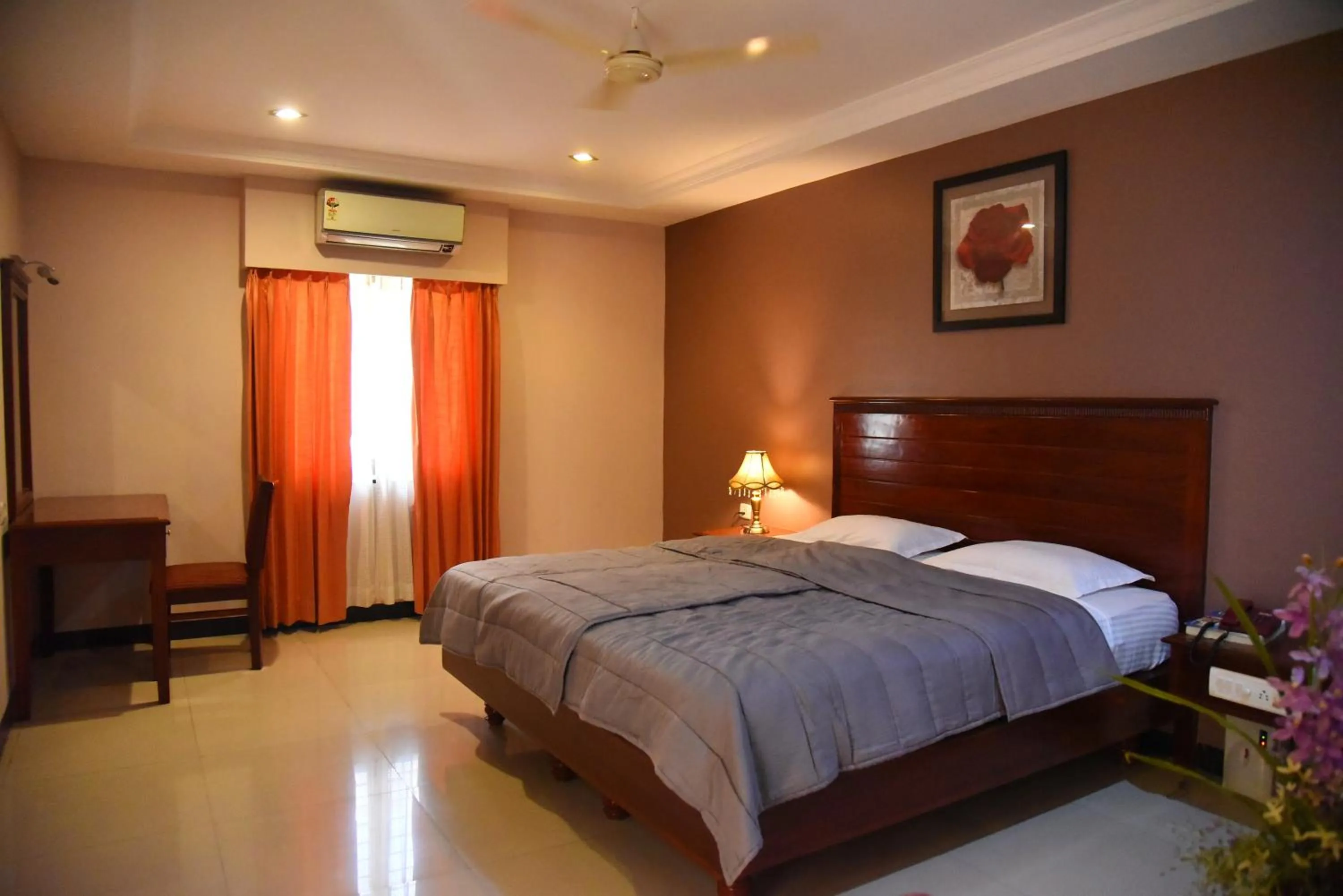 Bed in Hotel Subhalakshmi Palace