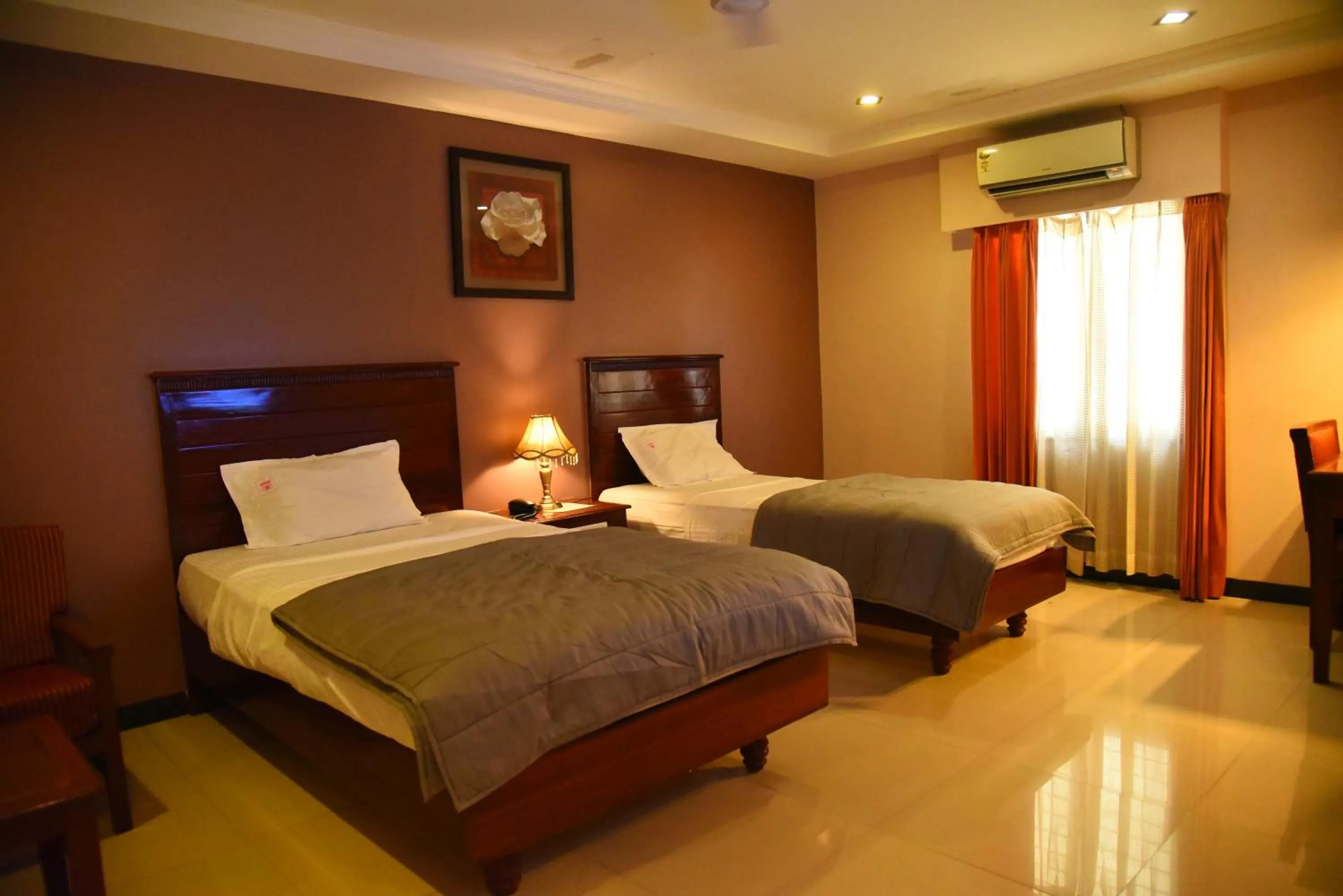 Bed in Hotel Subhalakshmi Palace