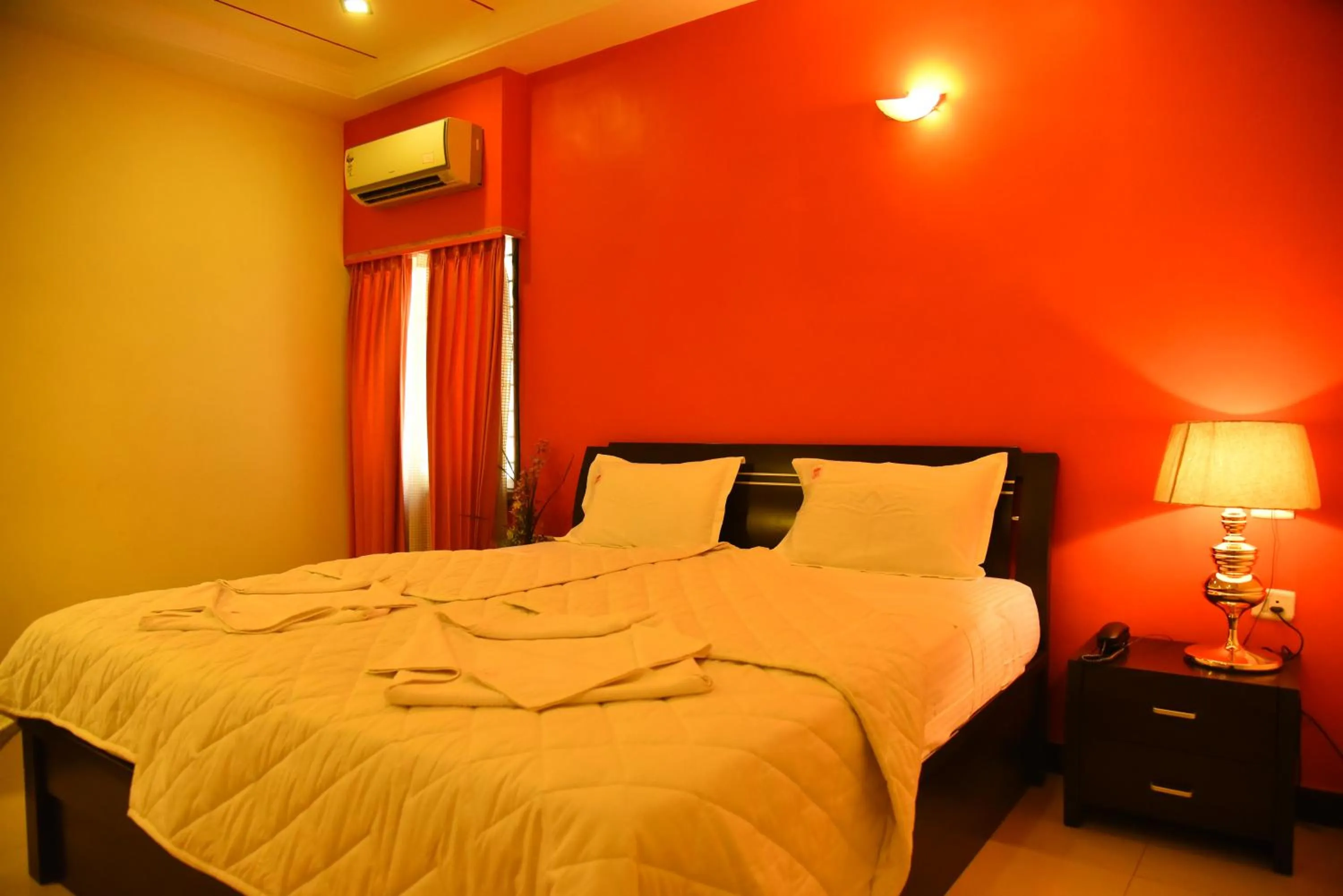 Bed in Hotel Subhalakshmi Palace