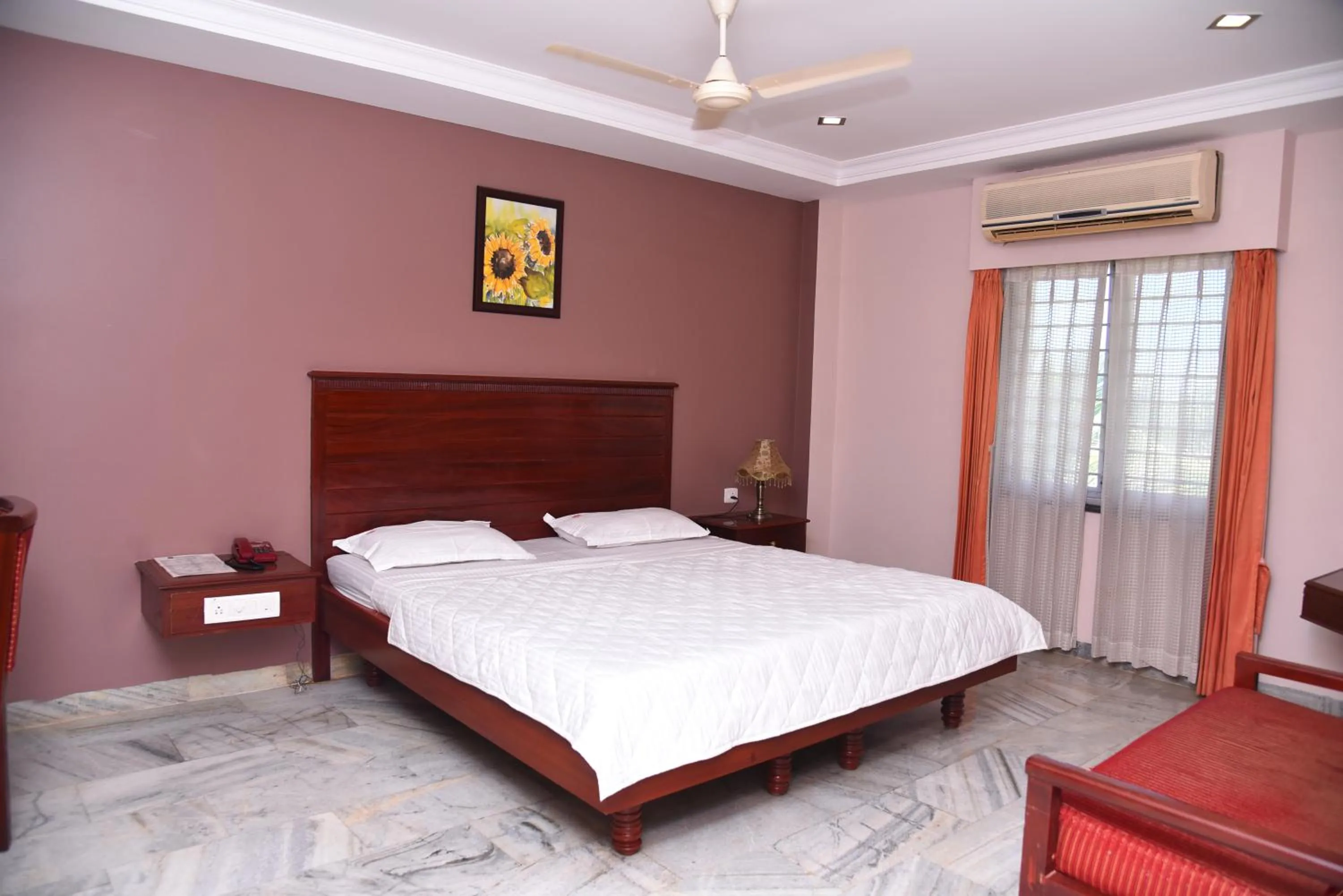 Bed in Hotel Subhalakshmi Palace