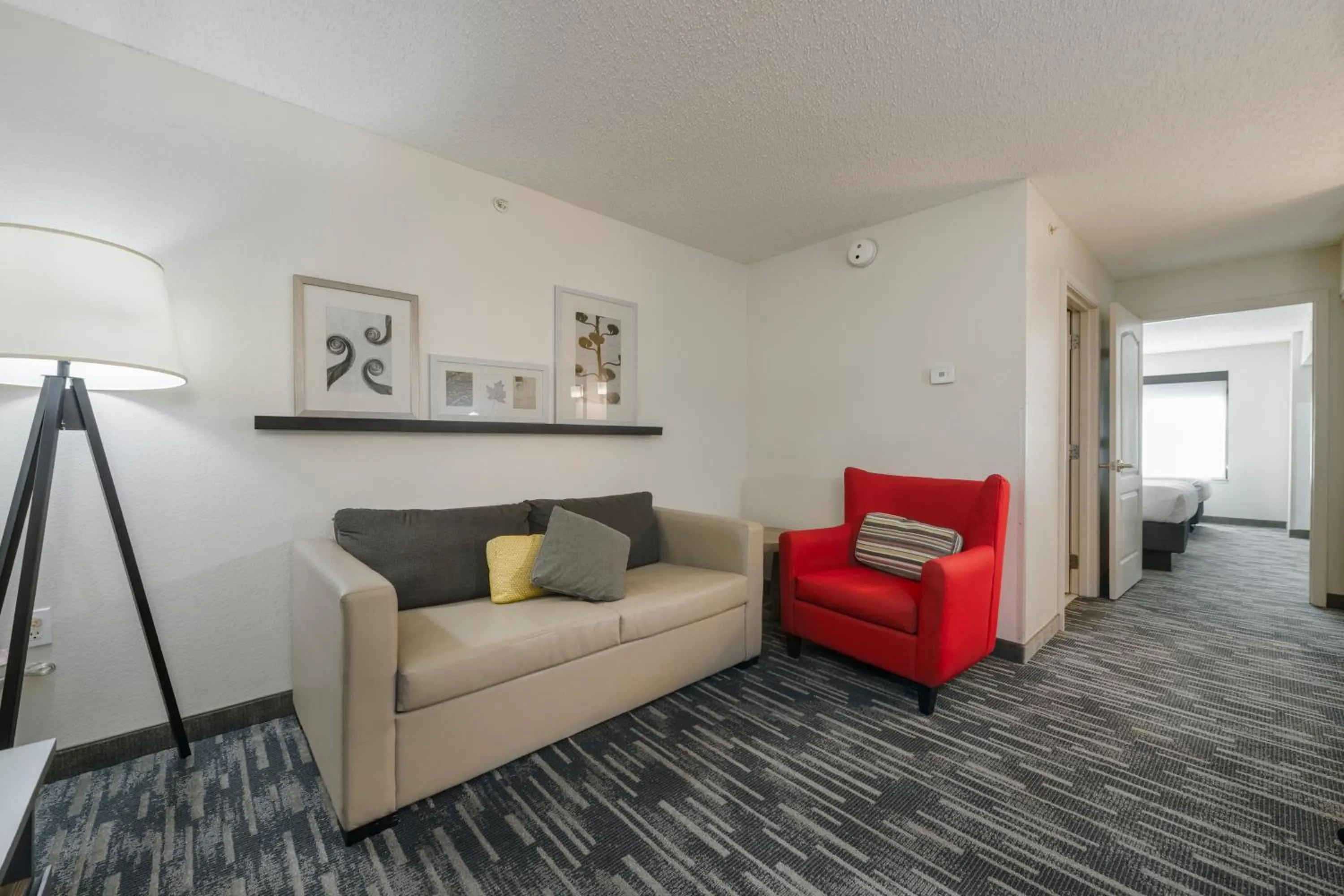 Living room in Country Inn & Suites by Radisson, Queensbury - Lake George , NY