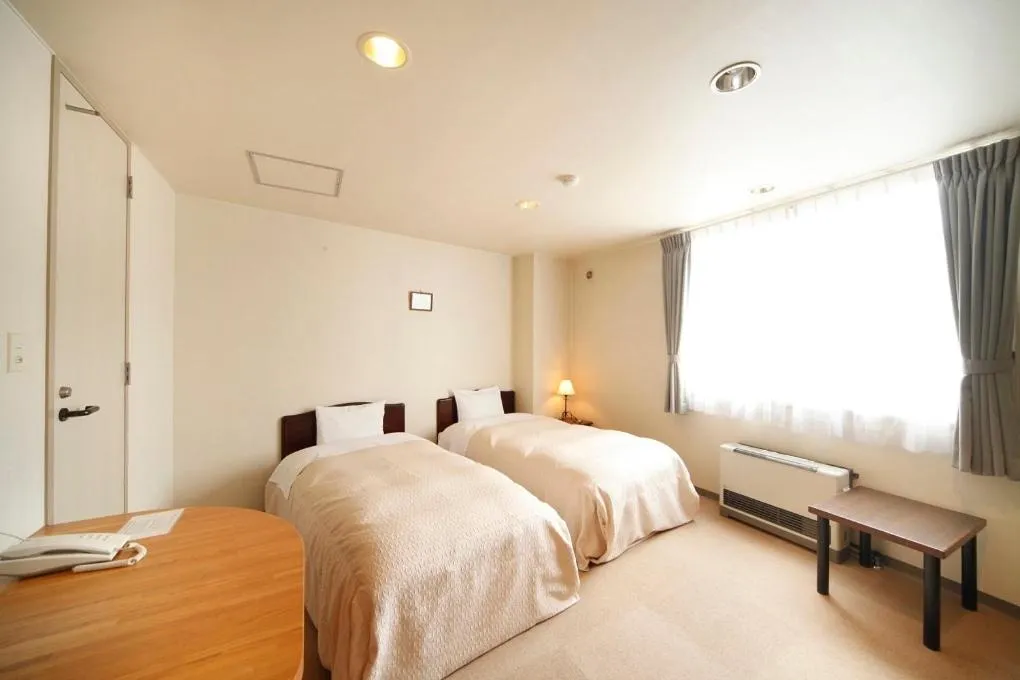 Bed in HOTEL 24sweets HAKUBA