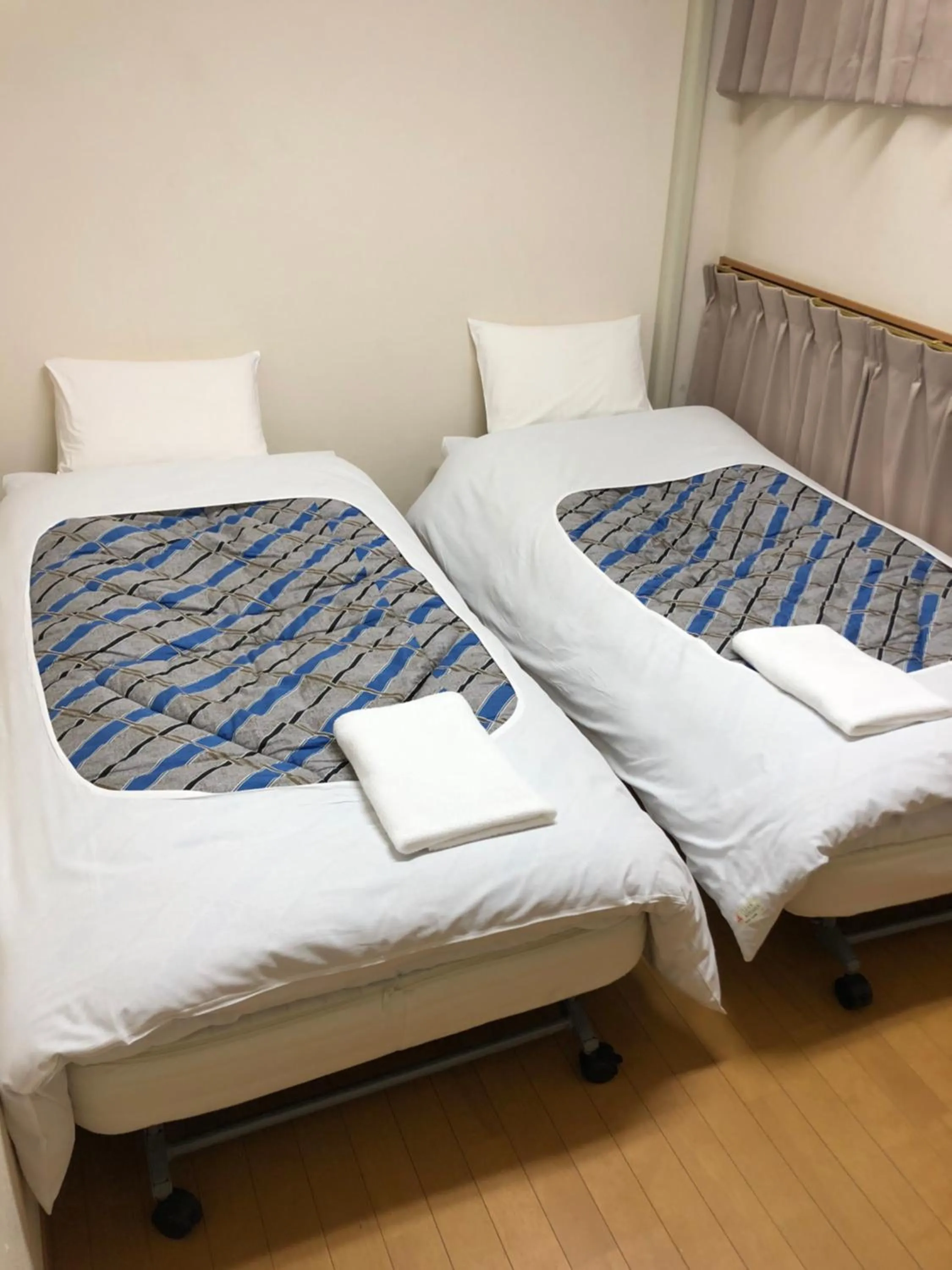 Photo of the whole room, Bed in Hotel Meigetsu
