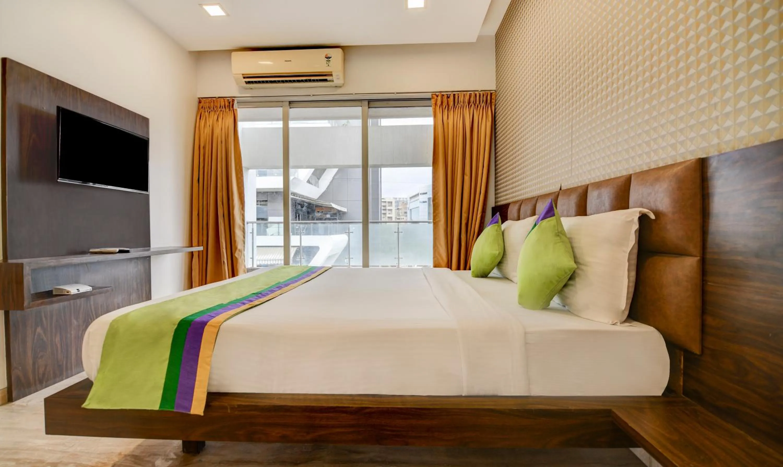 Bed in Treebo Kuval Inn