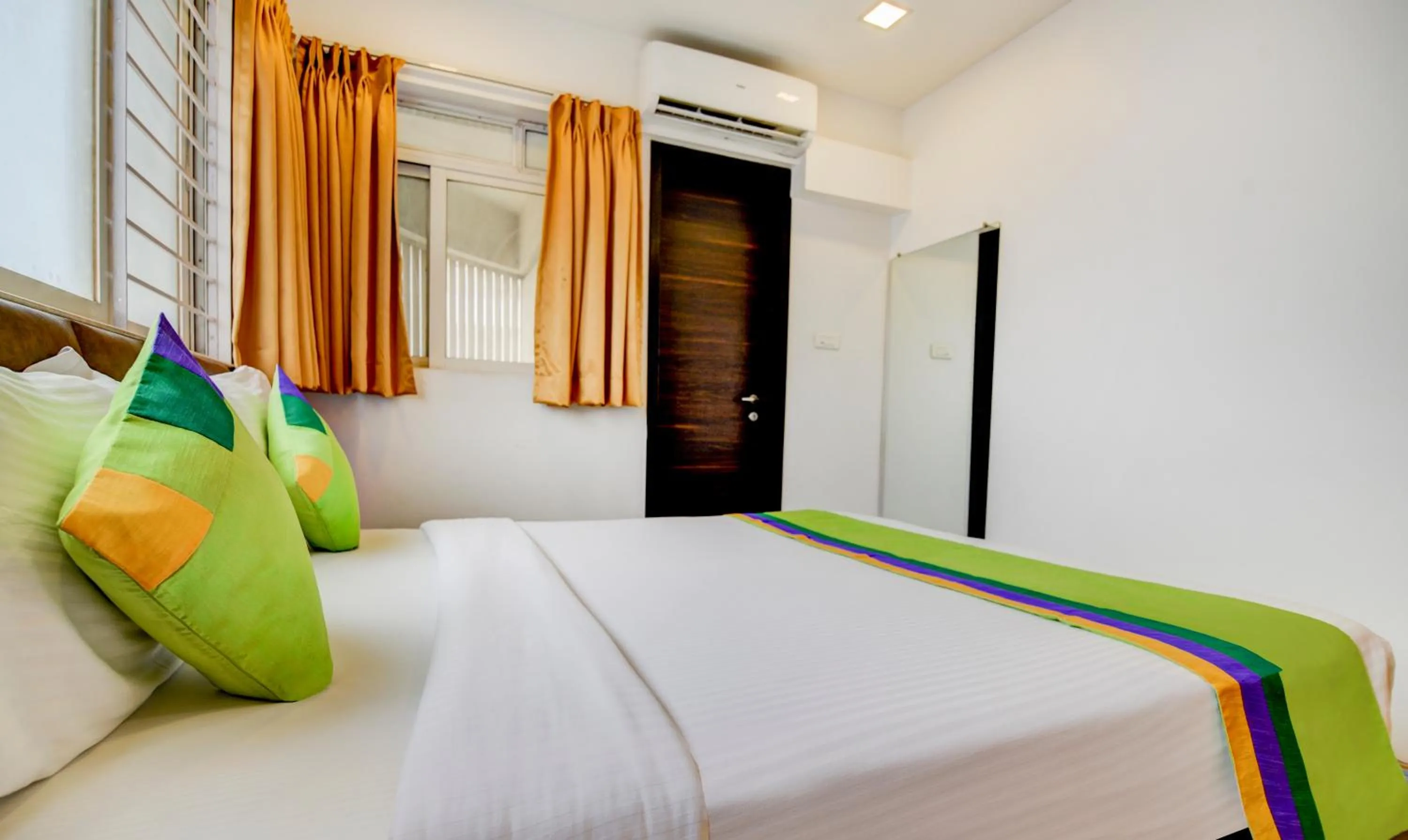 Bed in Treebo Kuval Inn