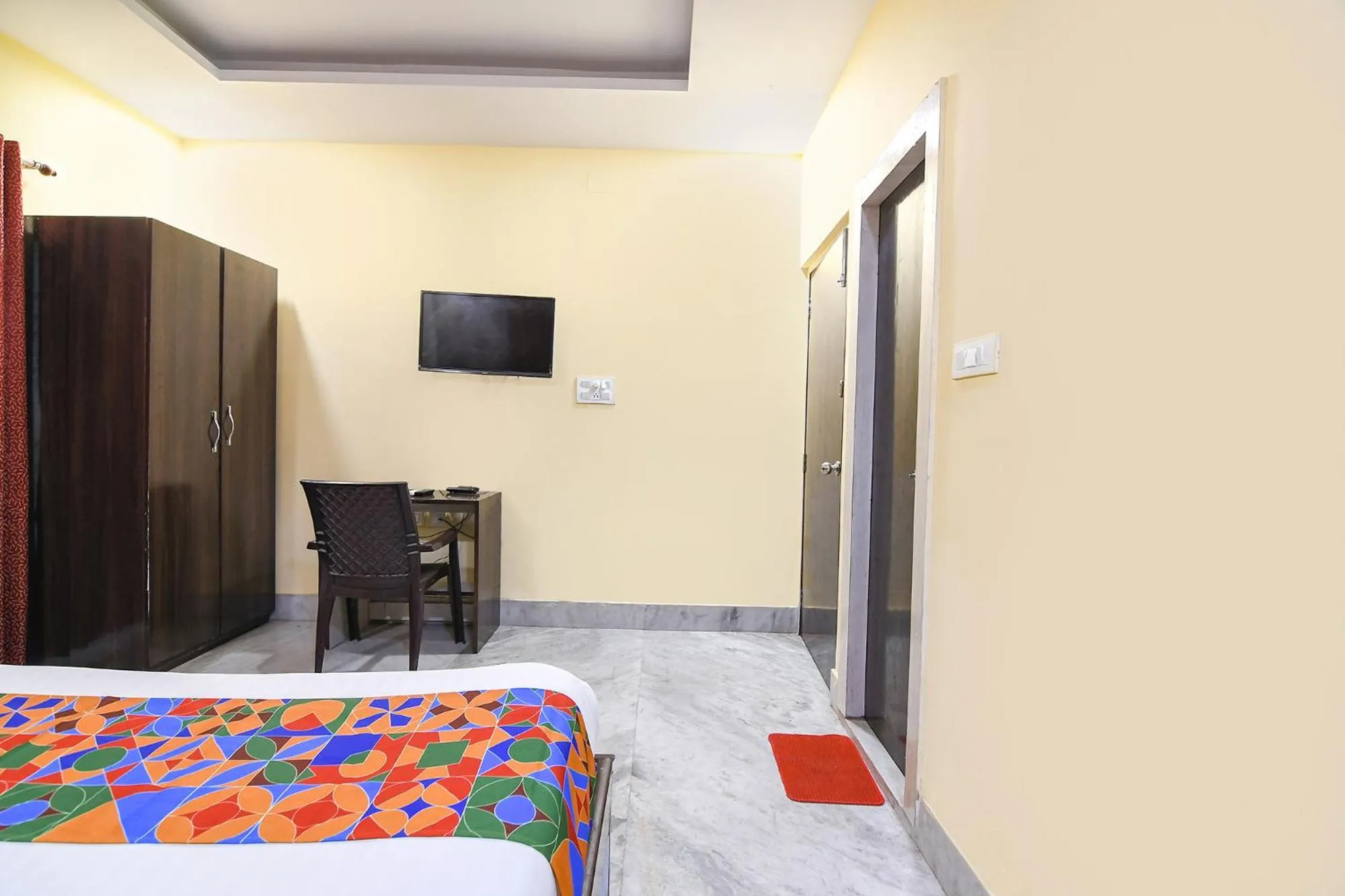 Bed in FabHotel Saltlake Palace - Nr Anandlok Hospital