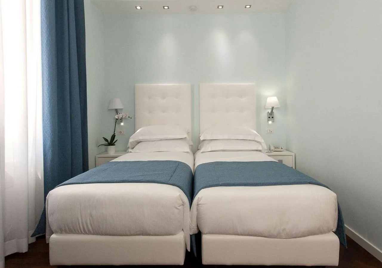 Photo of the whole room, Bed in Relais Villa Coppedè