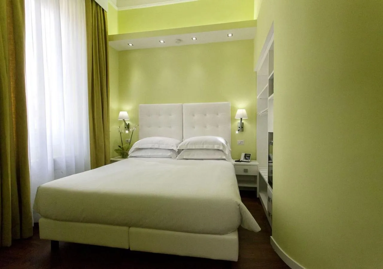 Photo of the whole room, Bed in Relais Villa Coppedè