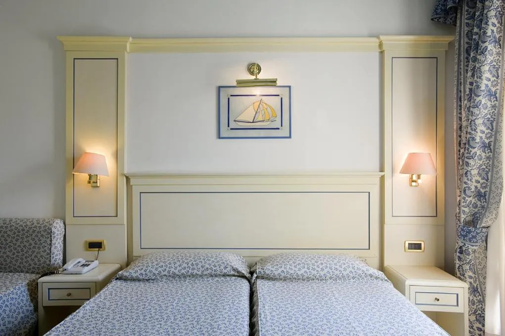 Bed in Hotel Poseidon