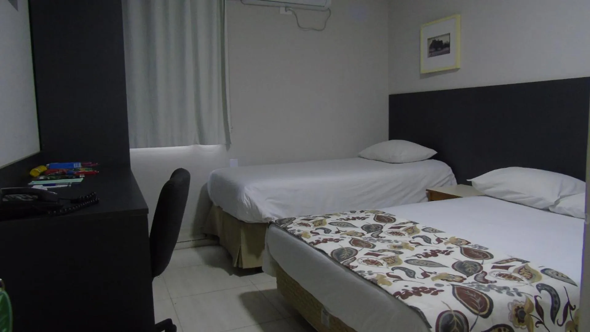 Bed in Paulista Garden Hotel