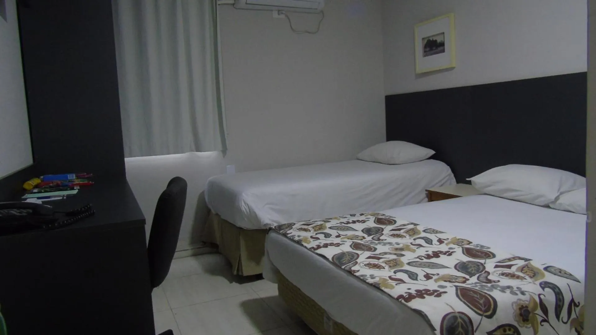 Bed in Paulista Garden Hotel