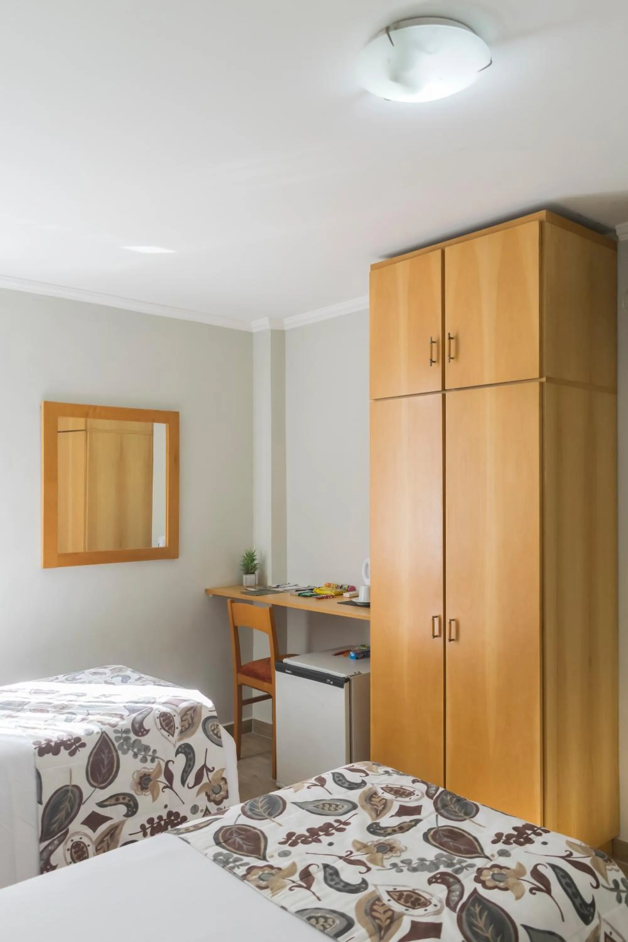 Bed in Paulista Garden Hotel