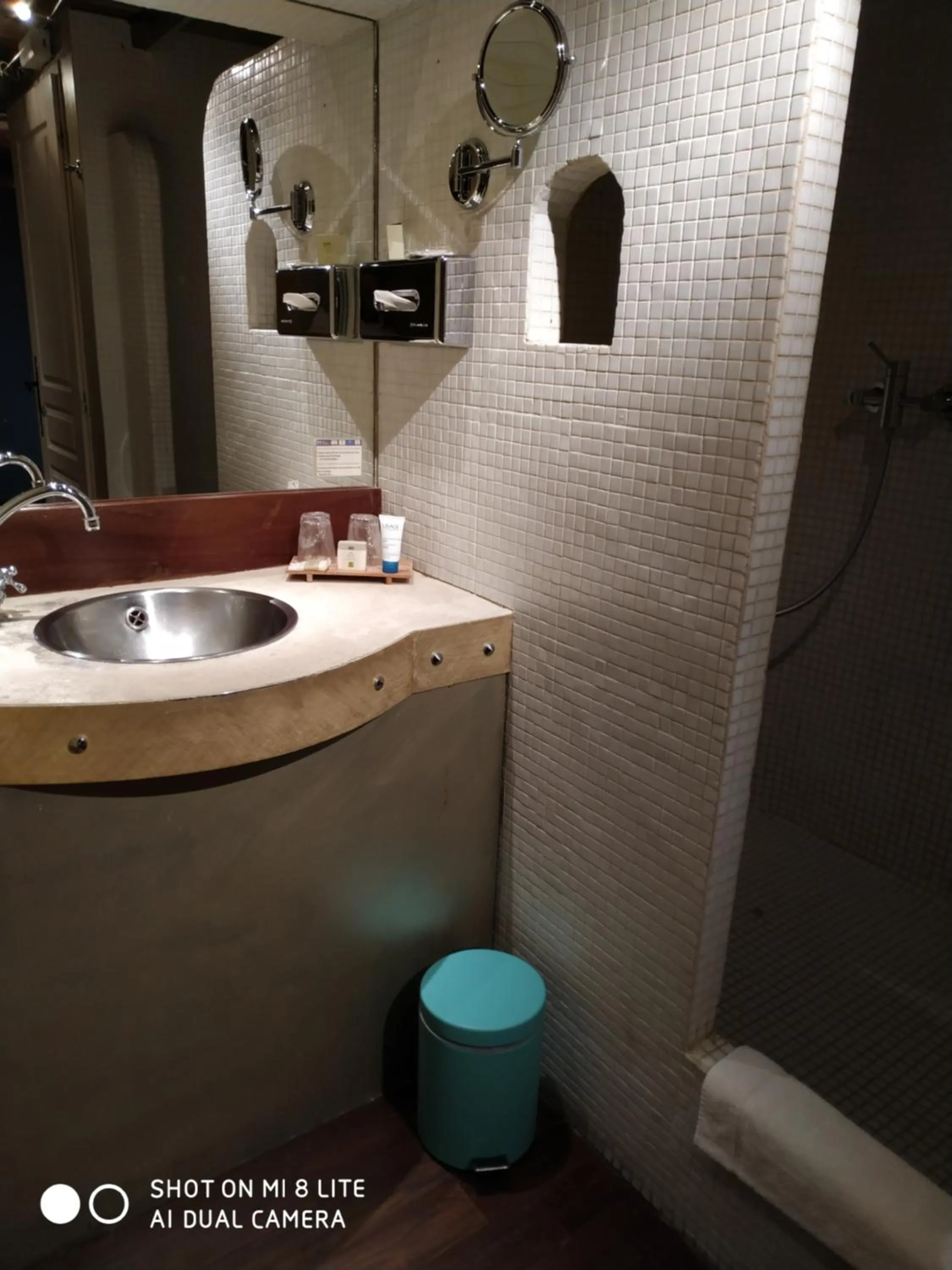 Bathroom in Logis Hôtel Les Pages