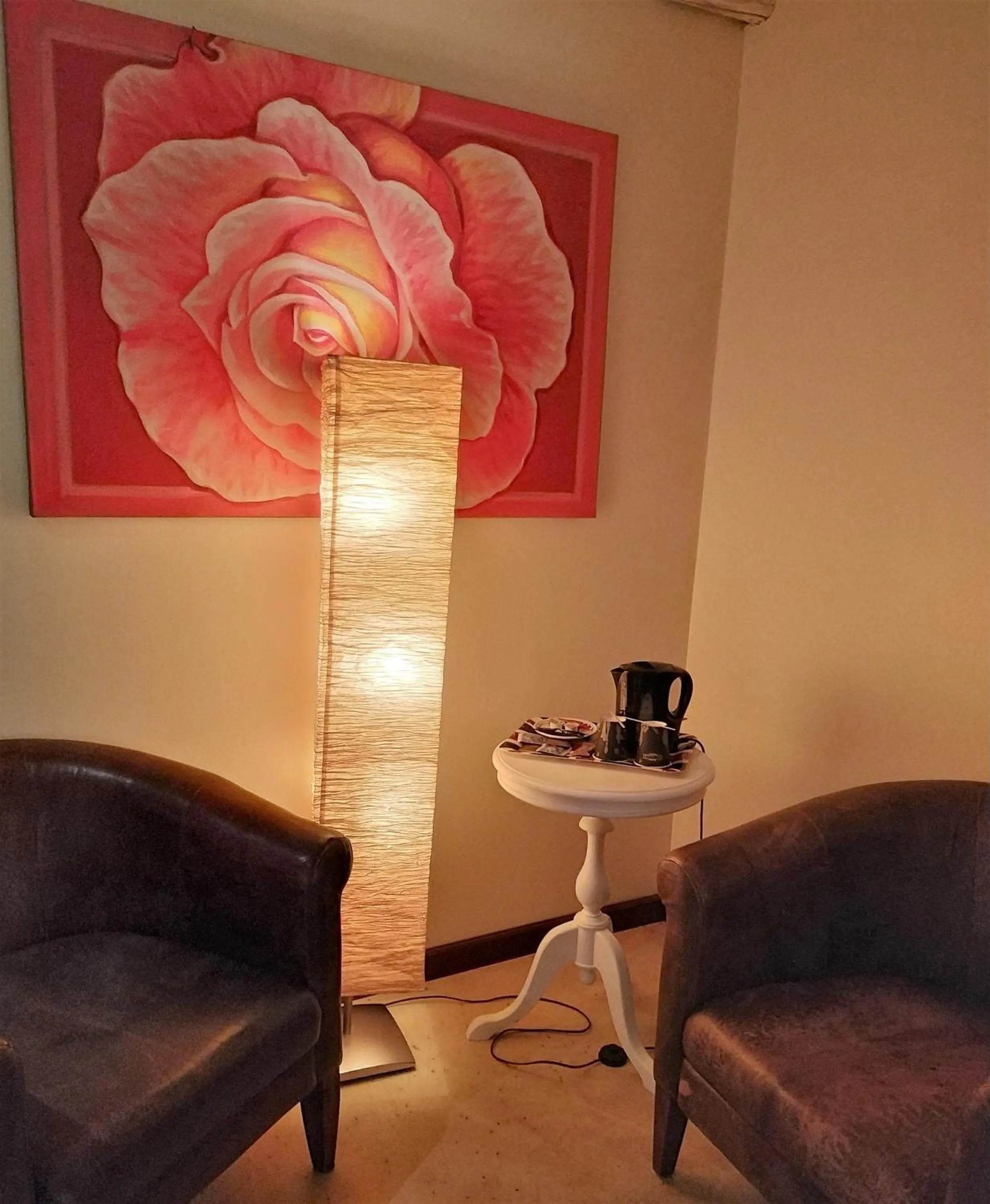 Seating area in Logis Hôtel Les Pages