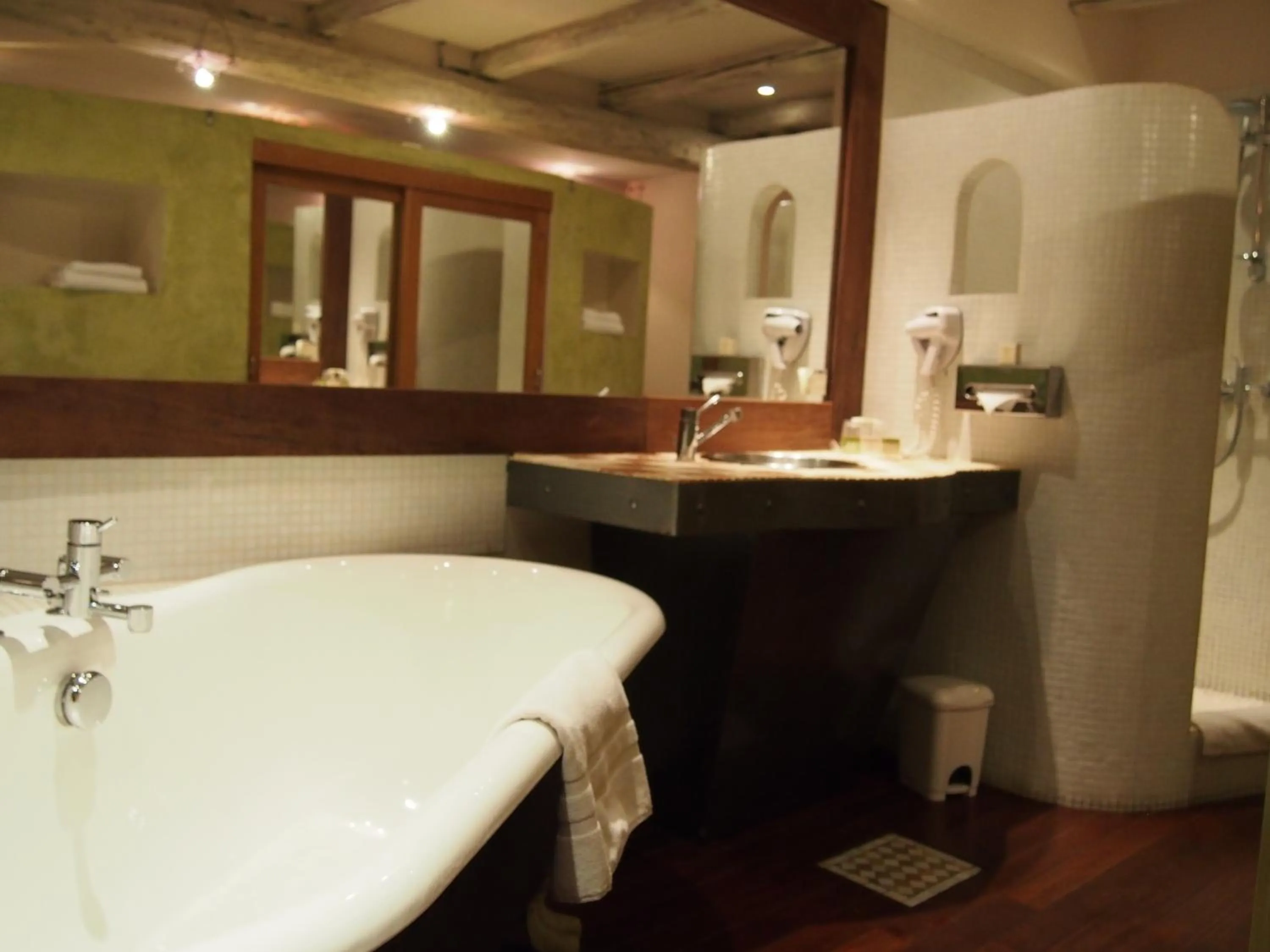 Bathroom in Logis Hôtel Les Pages