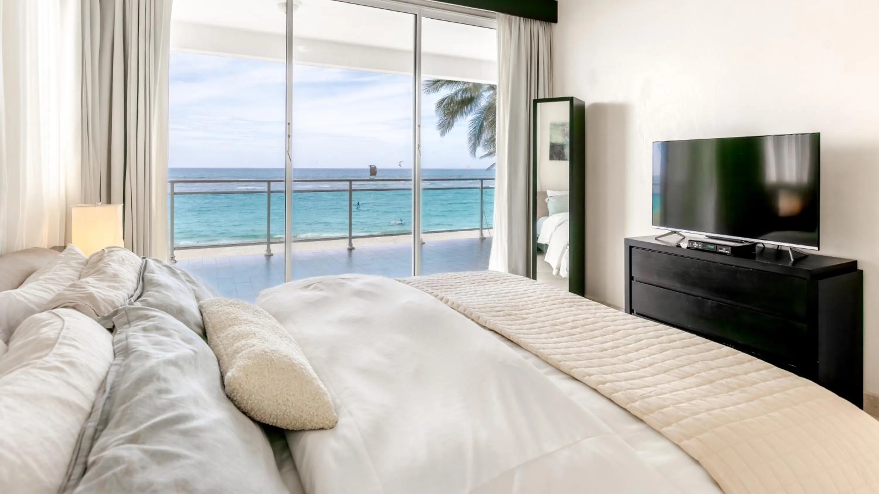 Bed in Watermark Luxury Oceanfront Residences