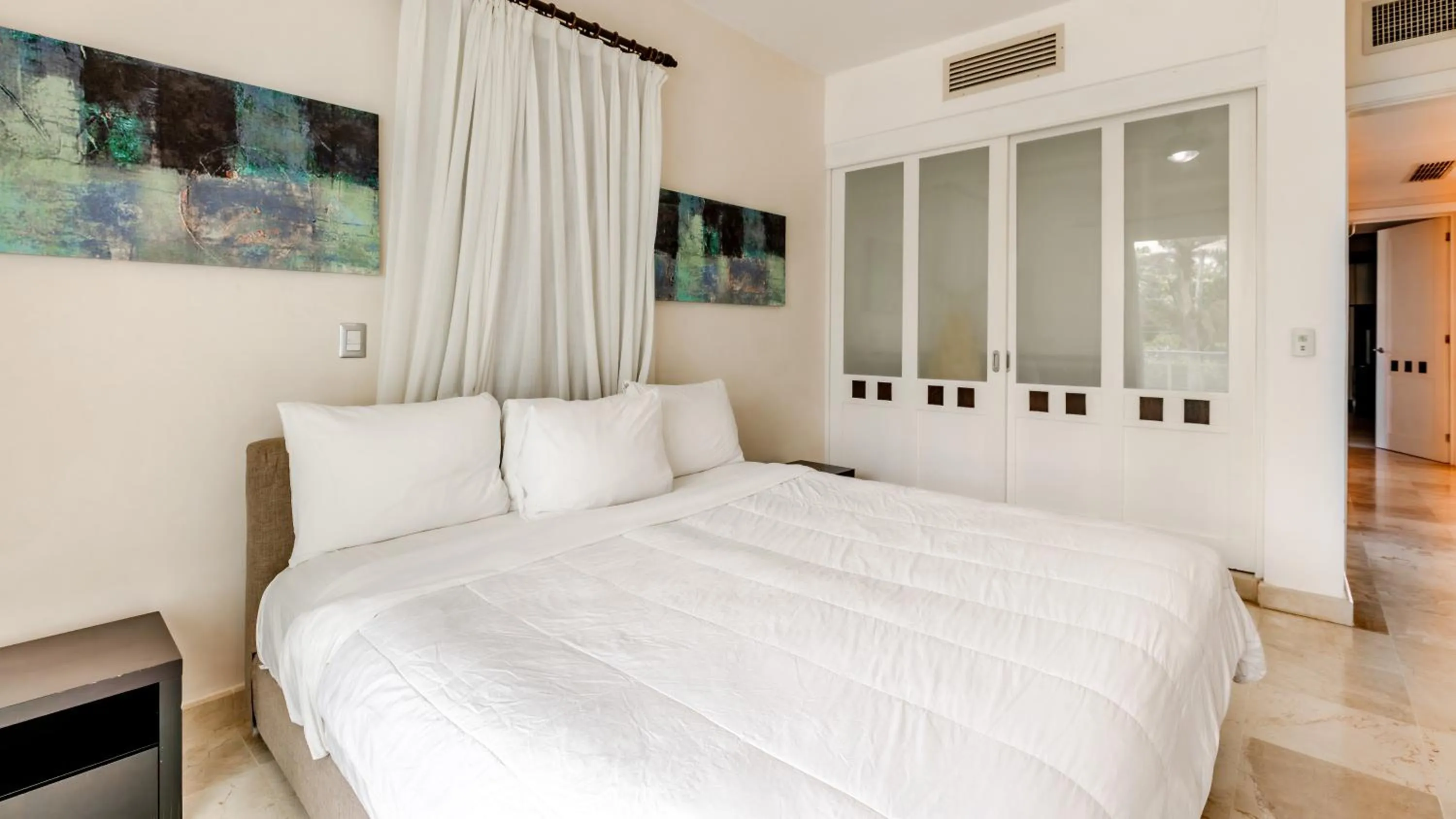 Bed in Watermark Luxury Oceanfront Residences