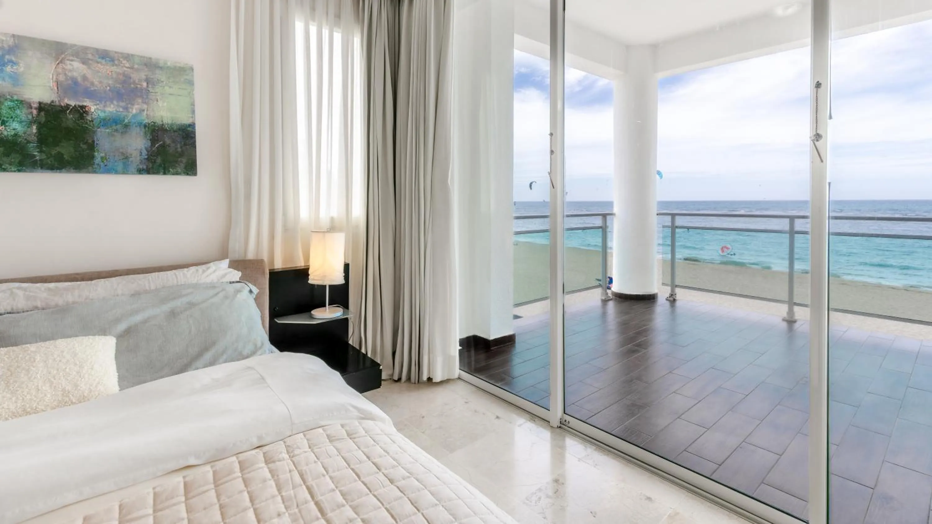 Bed in Watermark Luxury Oceanfront Residences