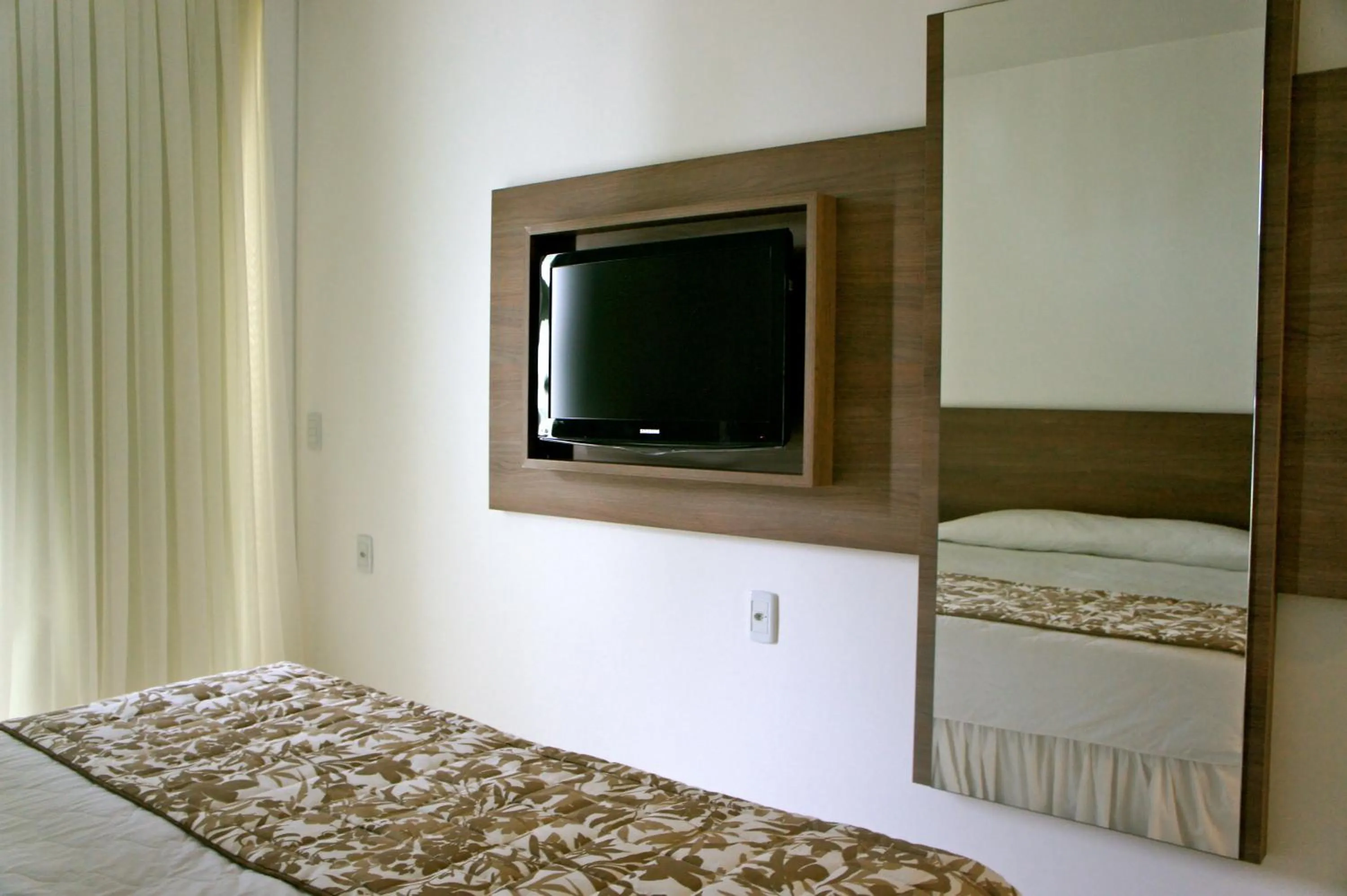 Bedroom, Bed in Hotel Marambaia Cabeçudas - frente mar