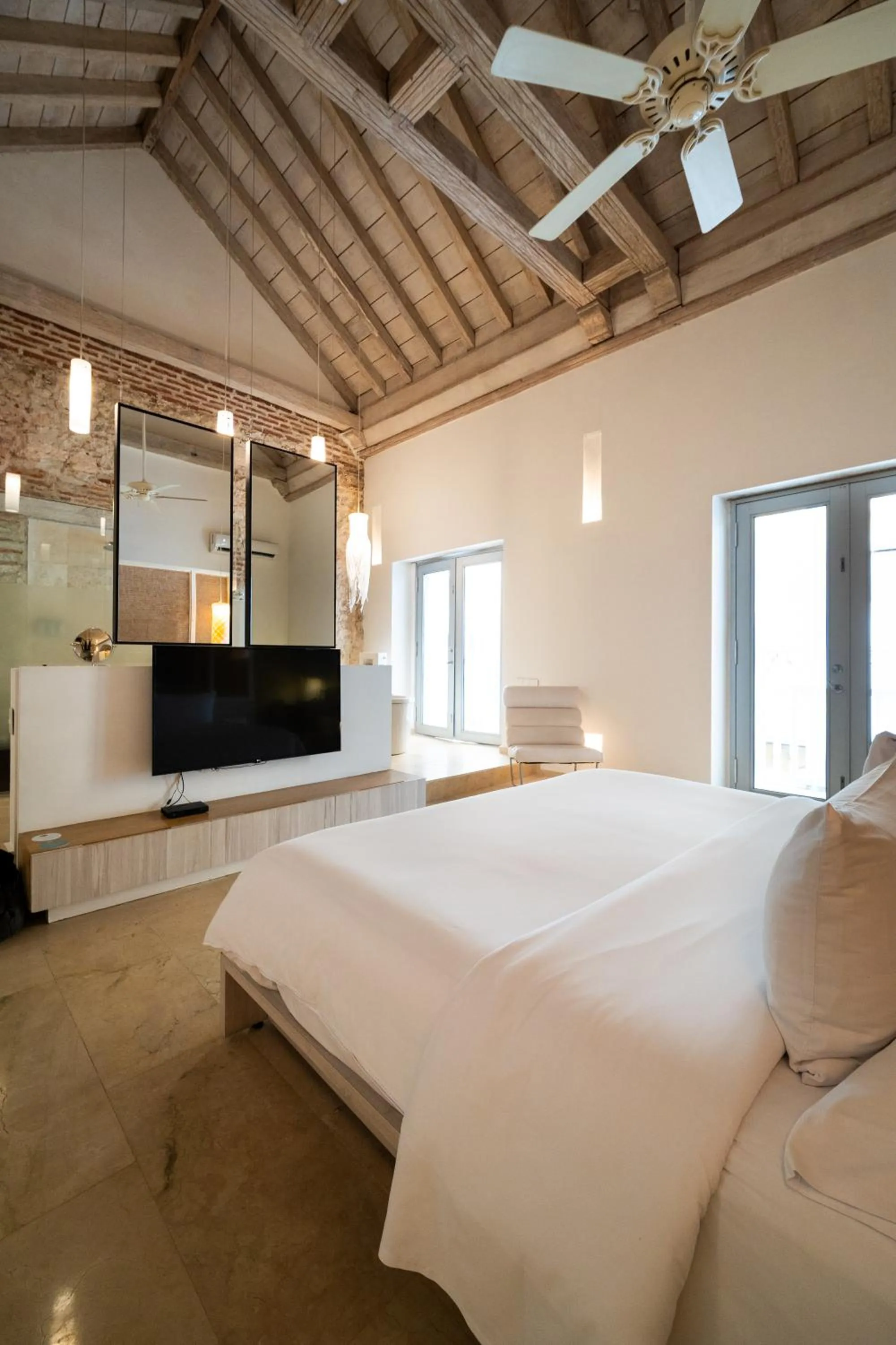 Bed in Nacar Hotel Cartagena, Curio Collection by Hilton