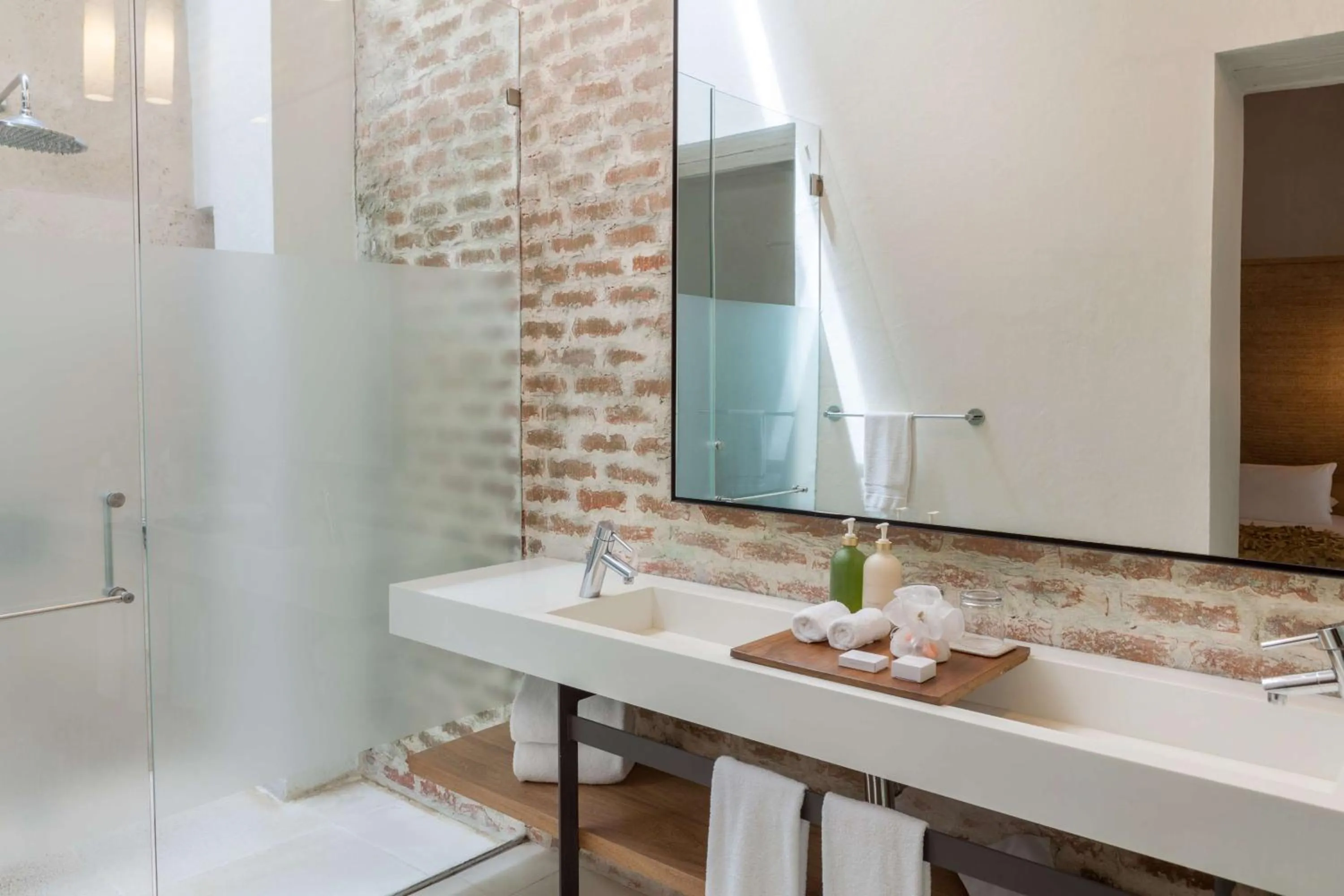 Bathroom in Nacar Hotel Cartagena, Curio Collection by Hilton