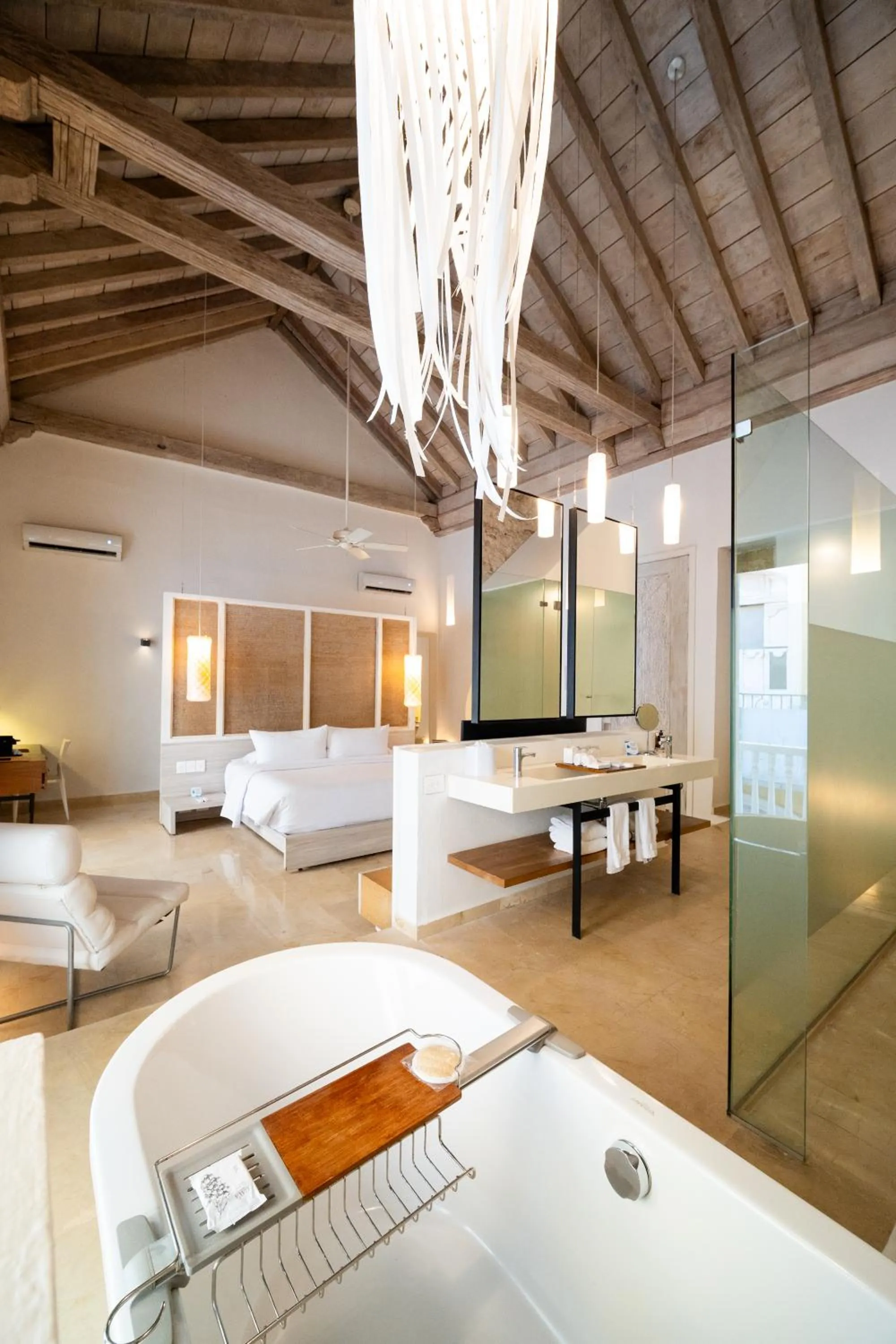 Bed in Nacar Hotel Cartagena, Curio Collection by Hilton