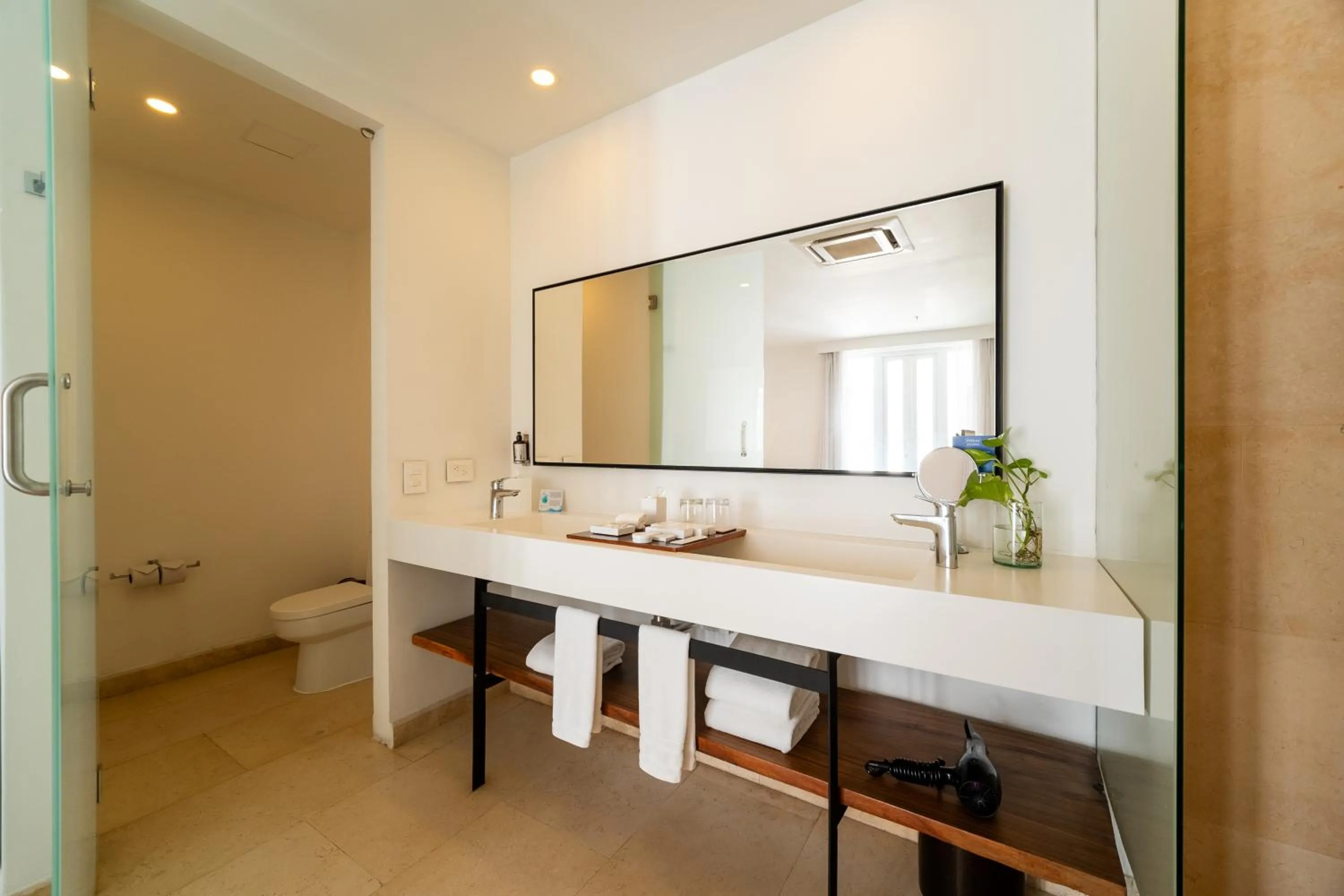 Bathroom in Nacar Hotel Cartagena, Curio Collection by Hilton