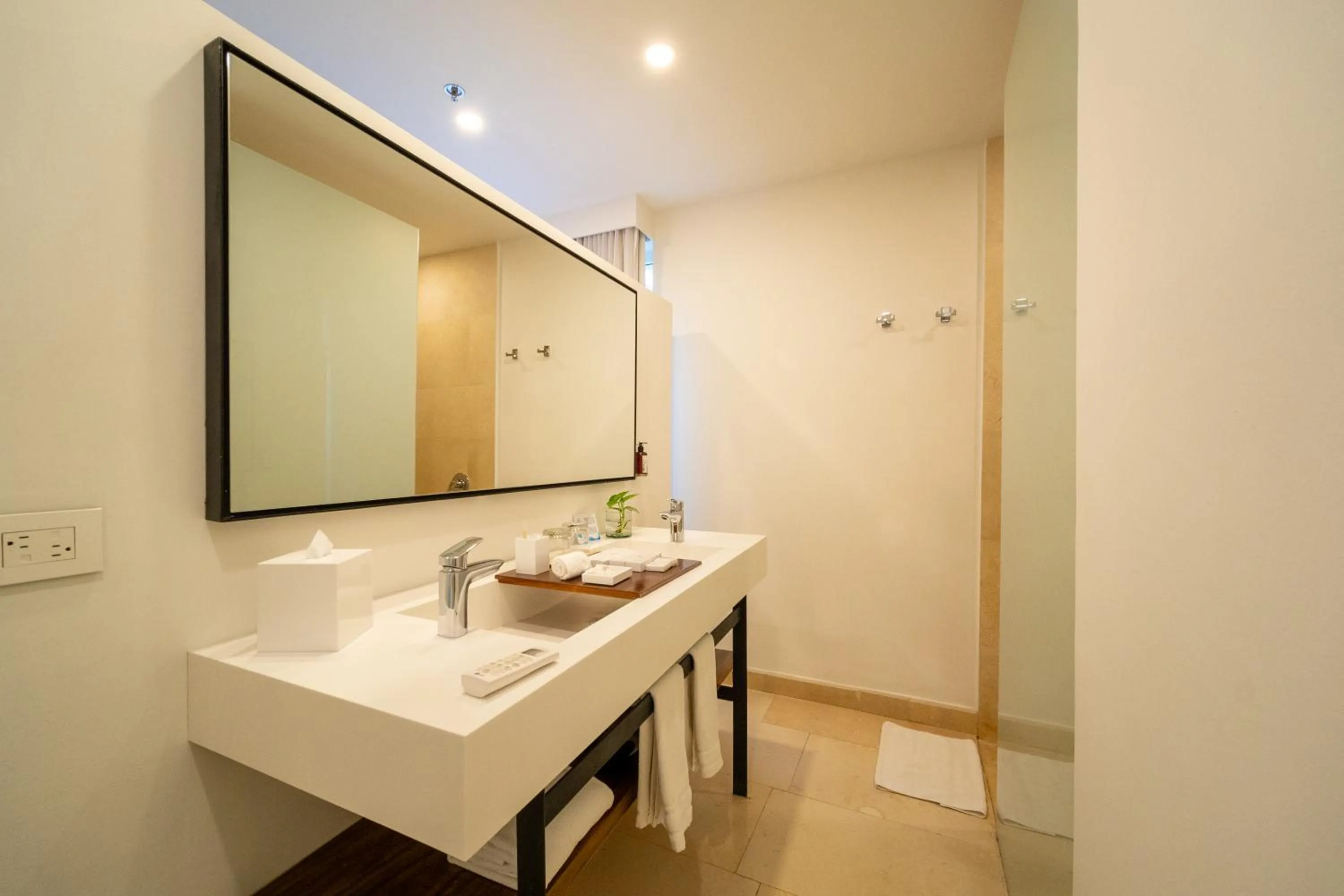 Bathroom in Nacar Hotel Cartagena, Curio Collection by Hilton