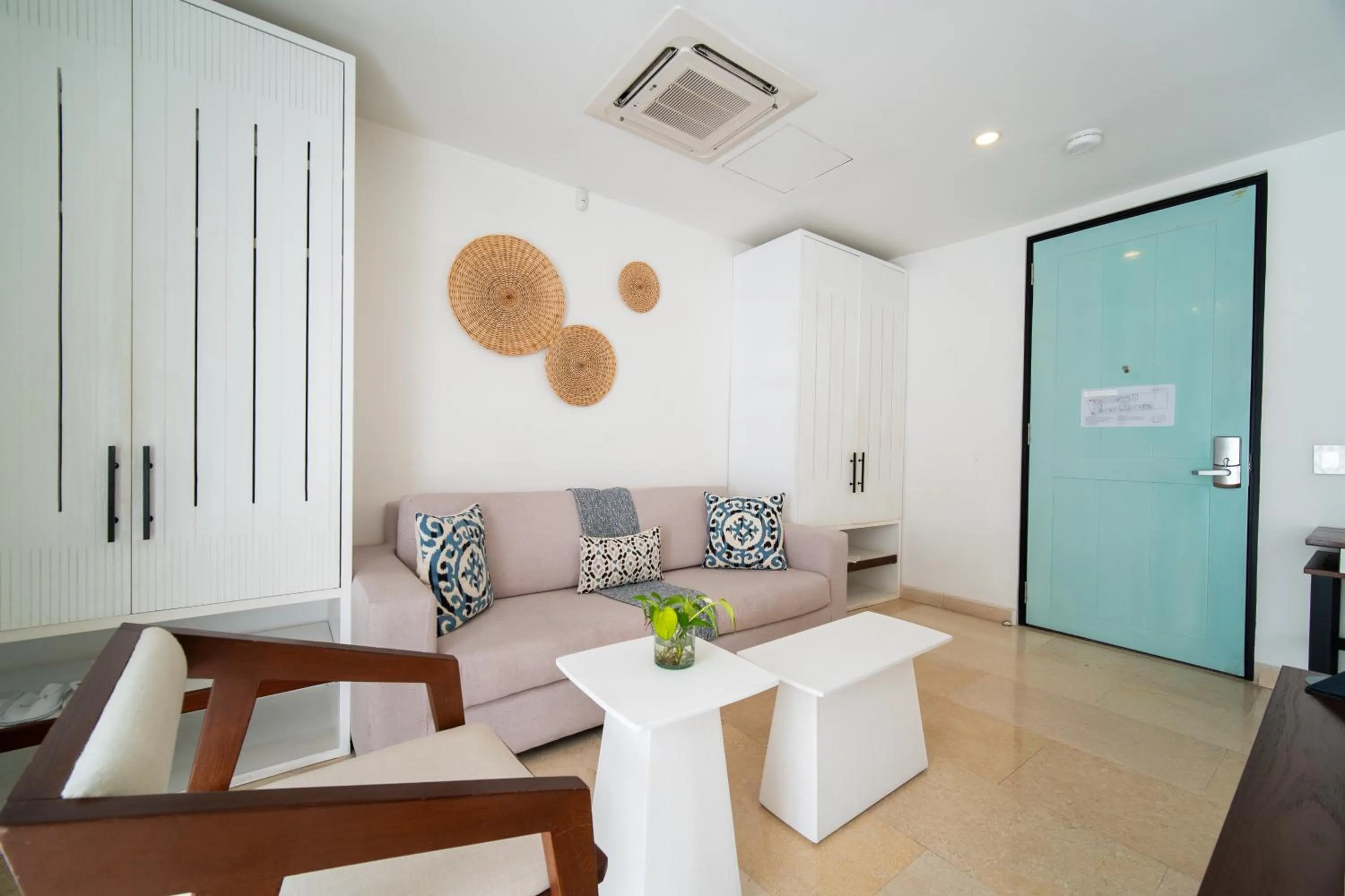 Seating area in Nacar Hotel Cartagena, Curio Collection by Hilton