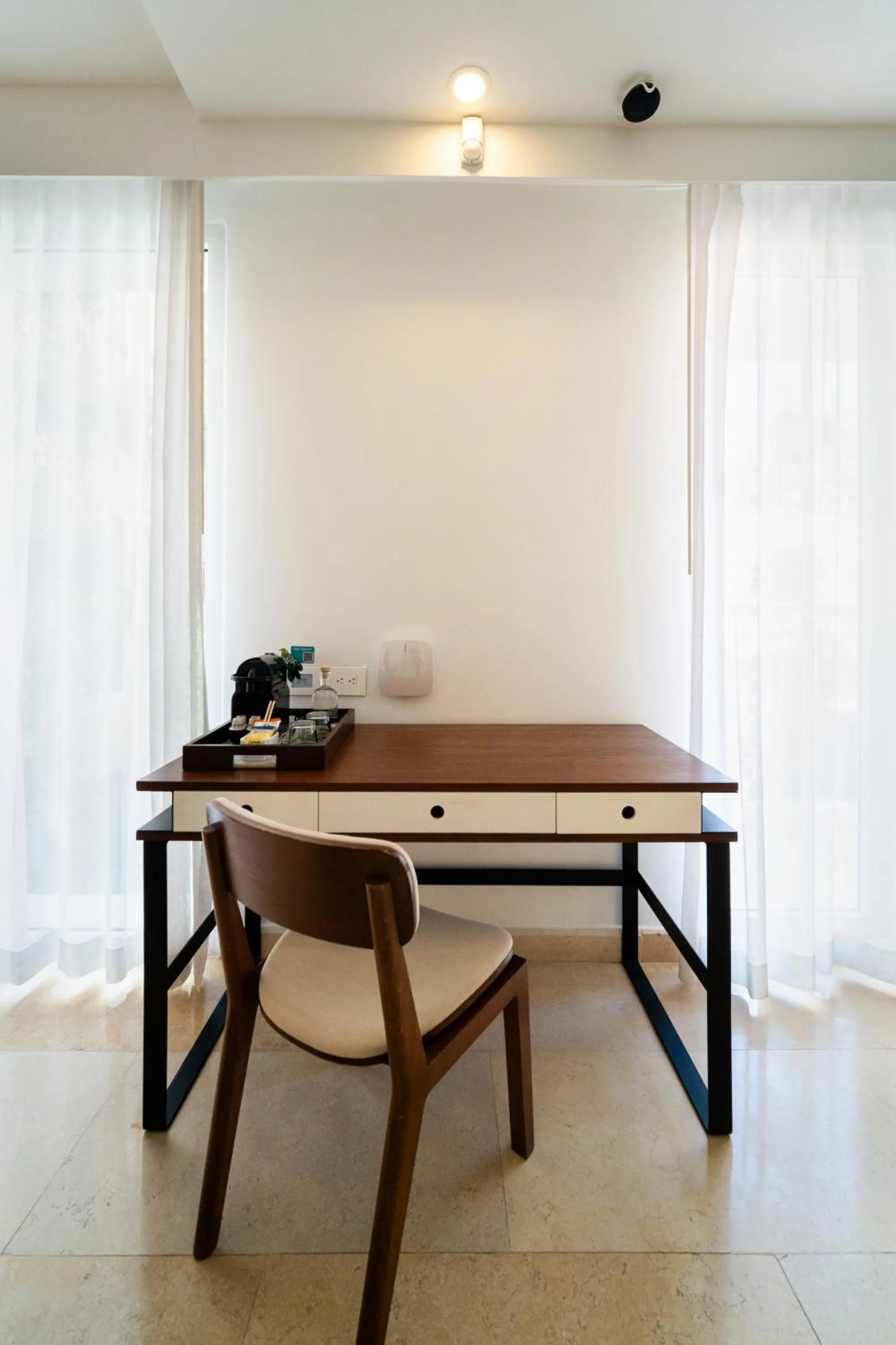 Seating area in Nacar Hotel Cartagena, Curio Collection by Hilton