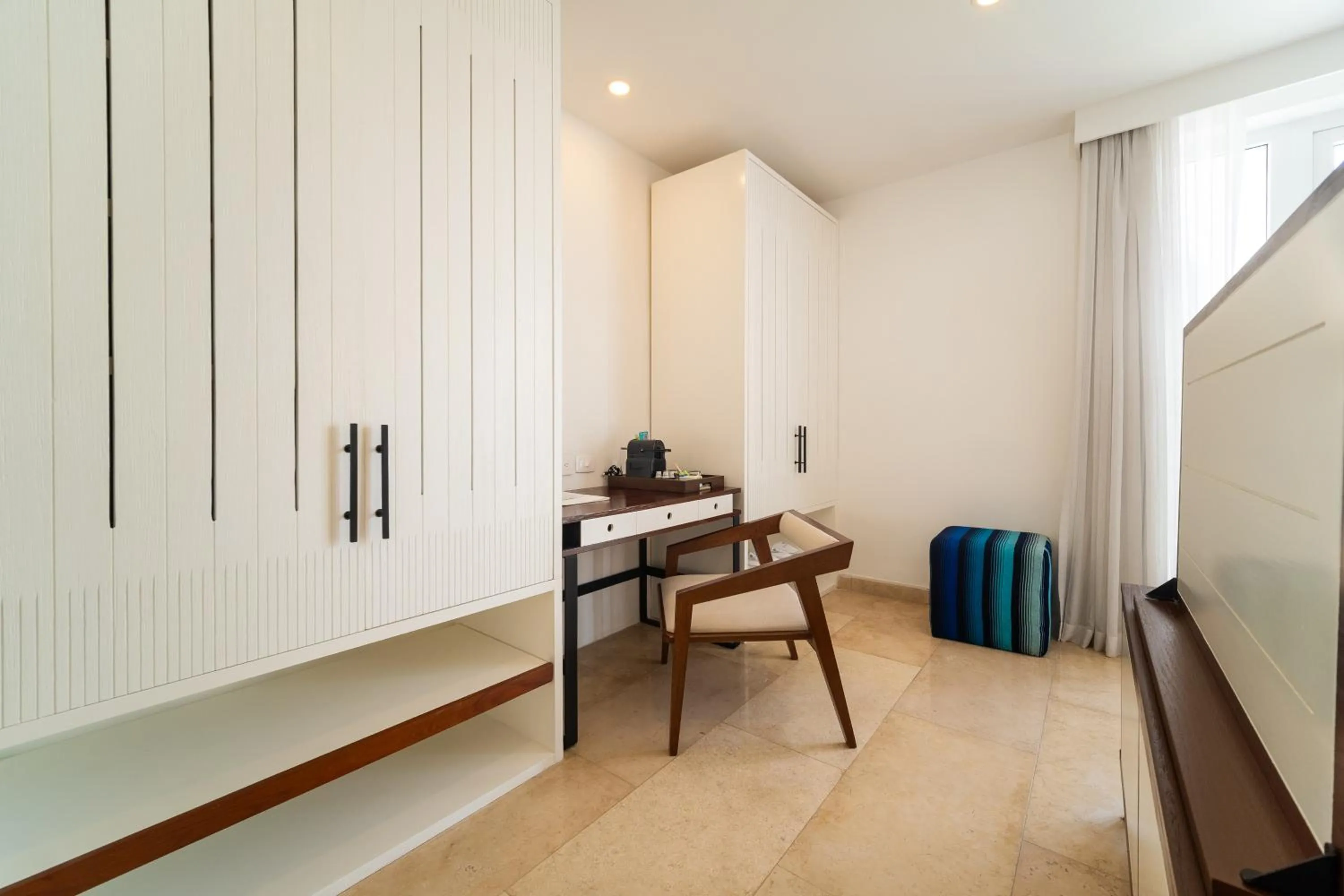 Seating area in Nacar Hotel Cartagena, Curio Collection by Hilton