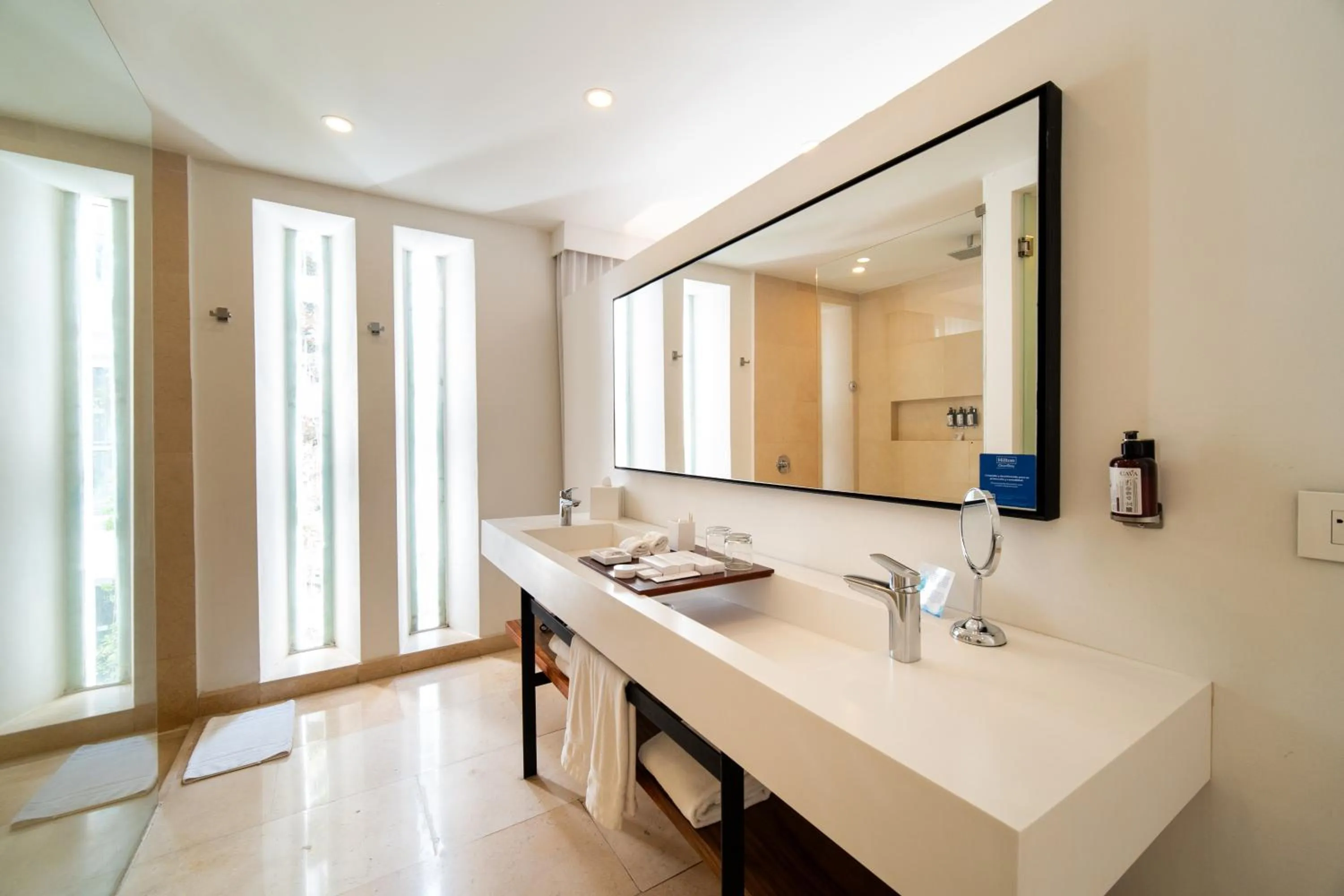 Bathroom in Nacar Hotel Cartagena, Curio Collection by Hilton