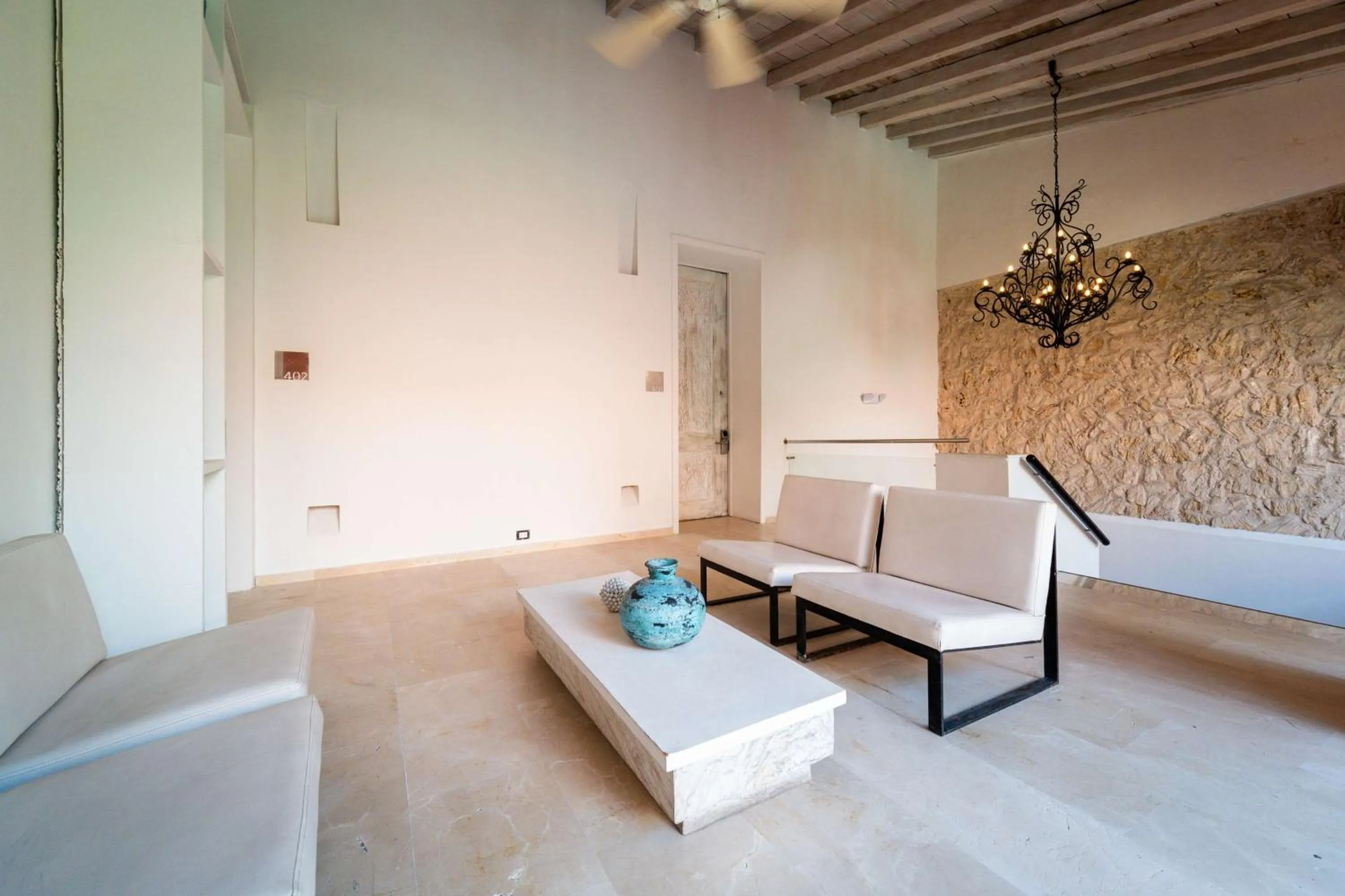 Living room in Nacar Hotel Cartagena, Curio Collection by Hilton