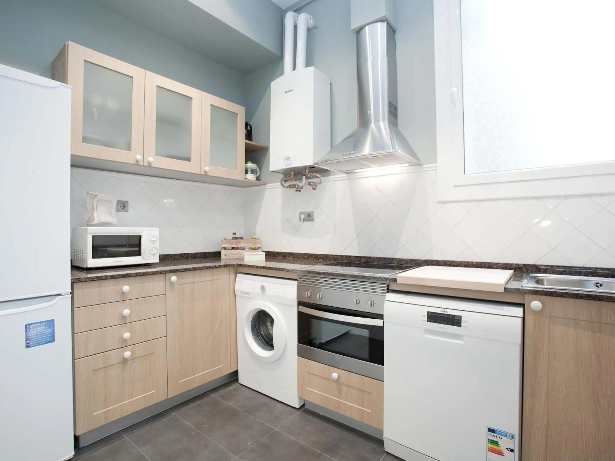 Kitchen or kitchenette in BCN Rambla Catalunya Apartments