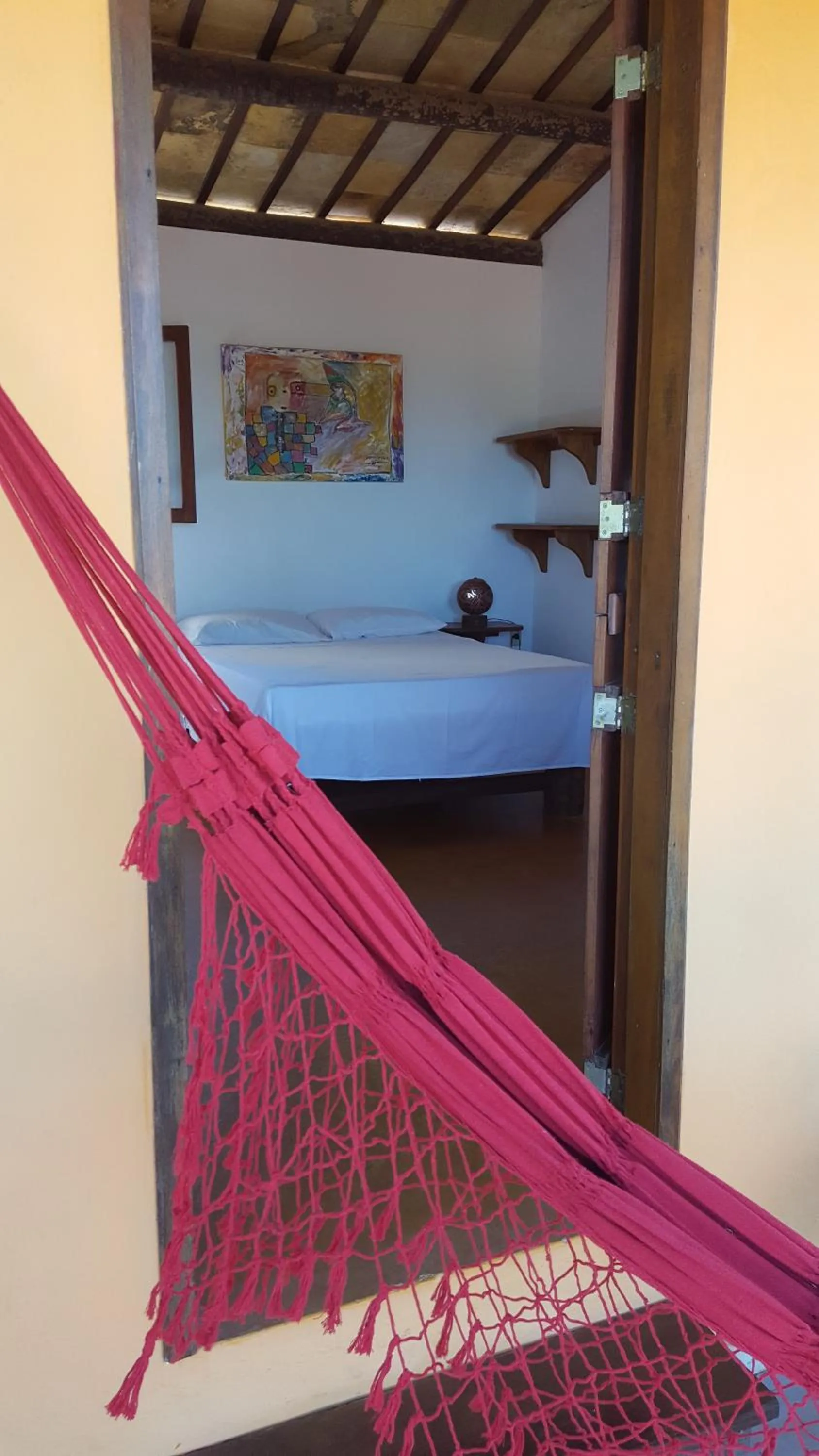 Bed in Pousada Agua Marinha