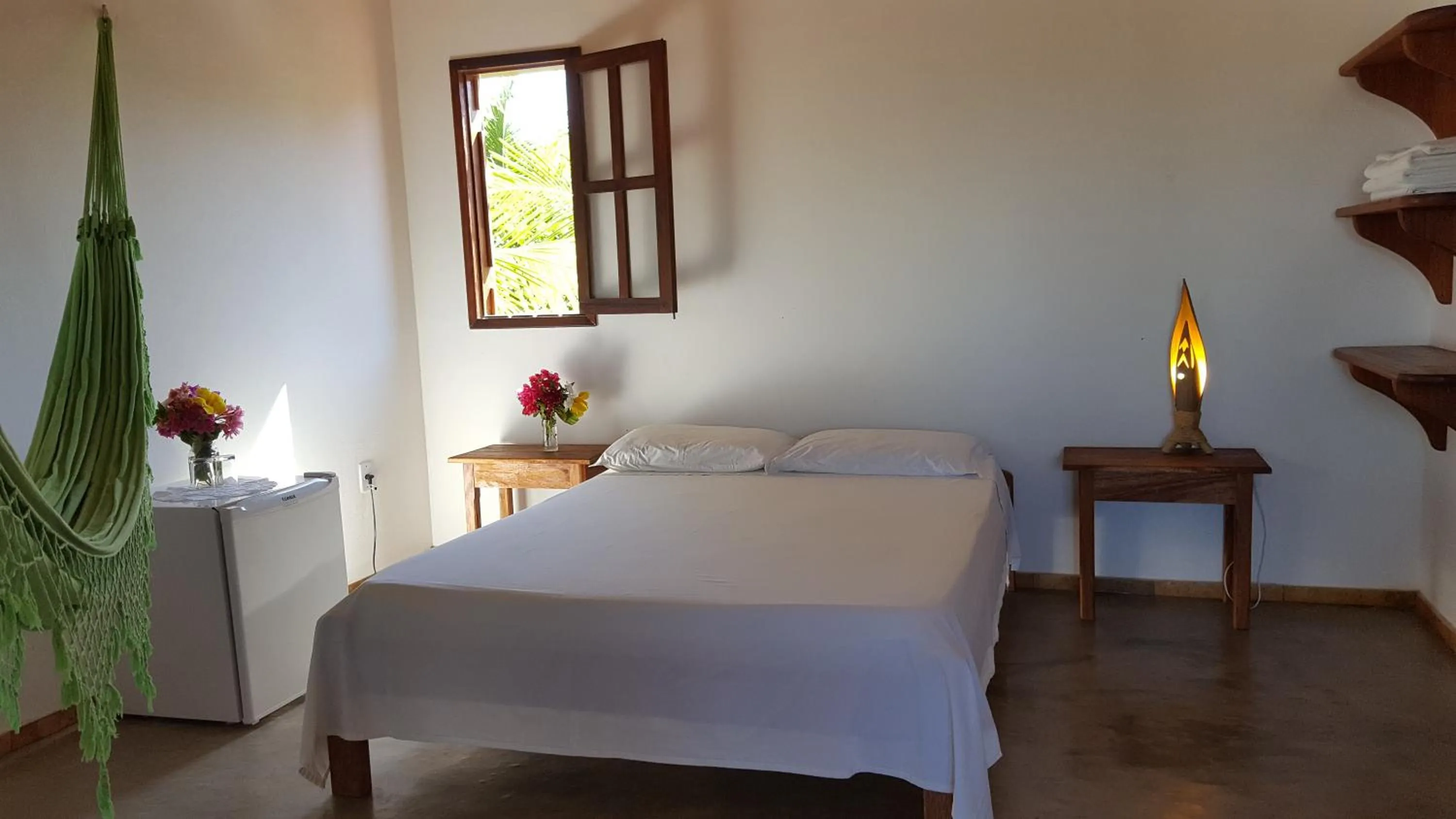 Bed in Pousada Agua Marinha