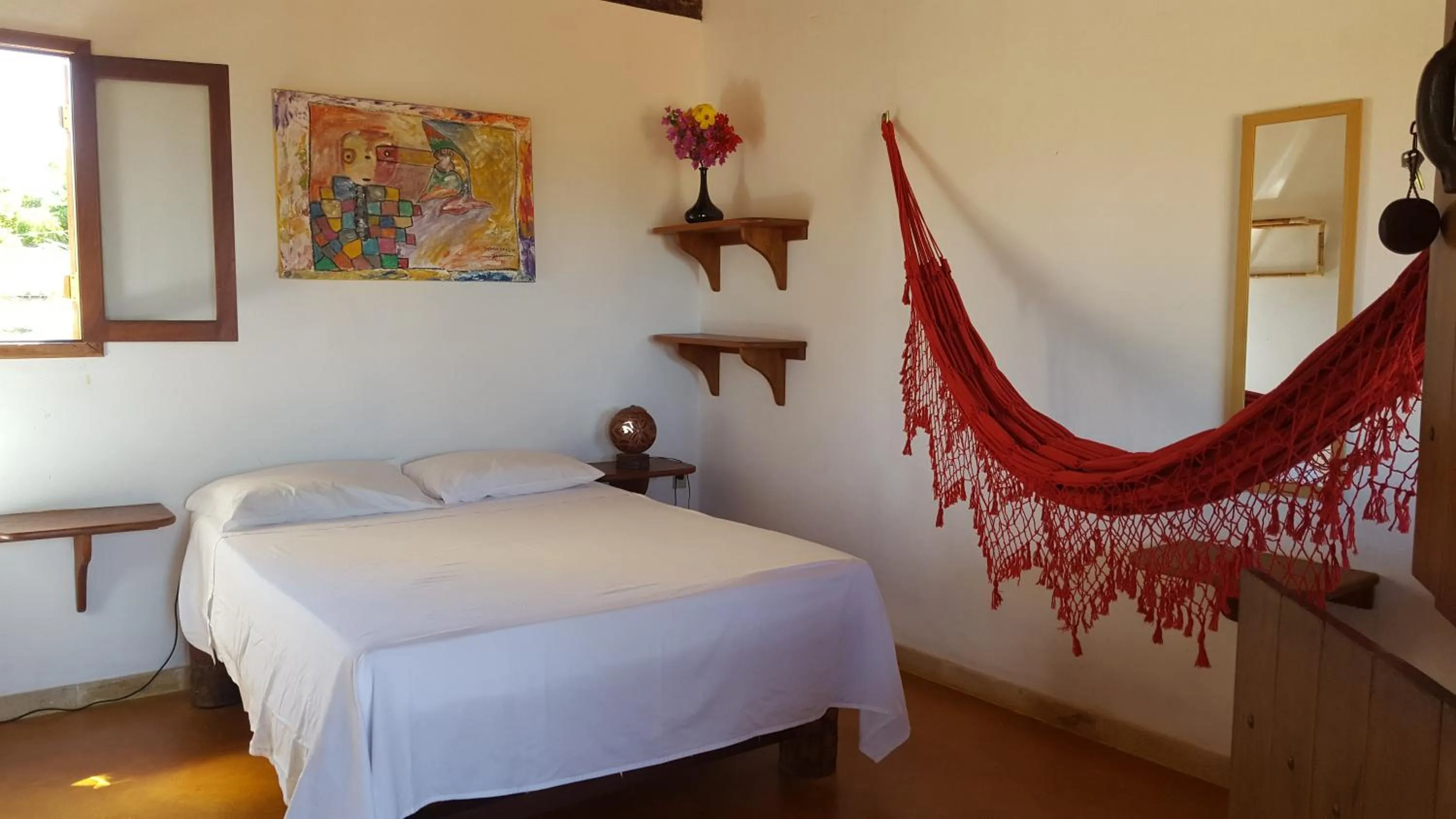 Bed in Pousada Agua Marinha