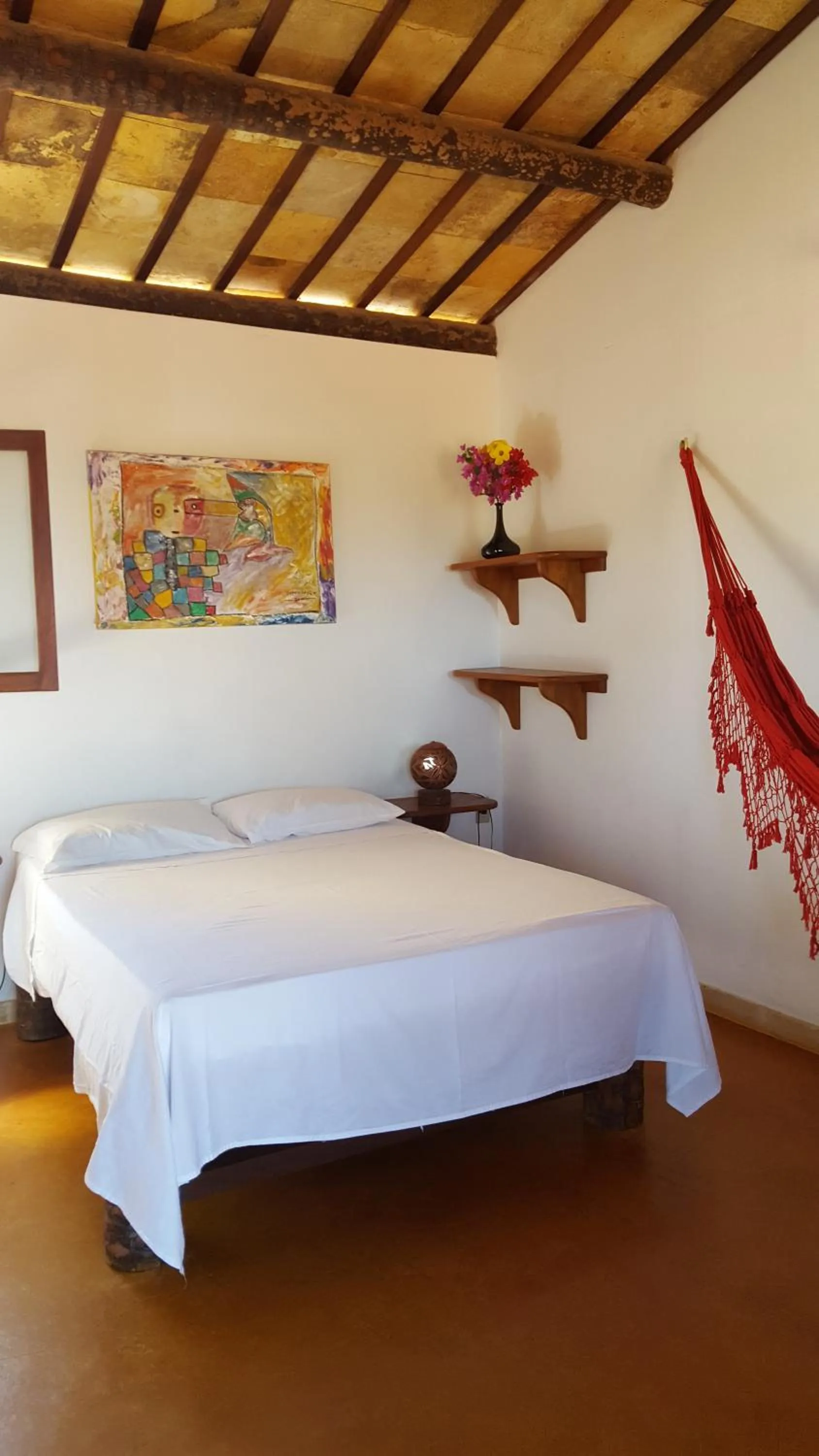 Bed in Pousada Agua Marinha