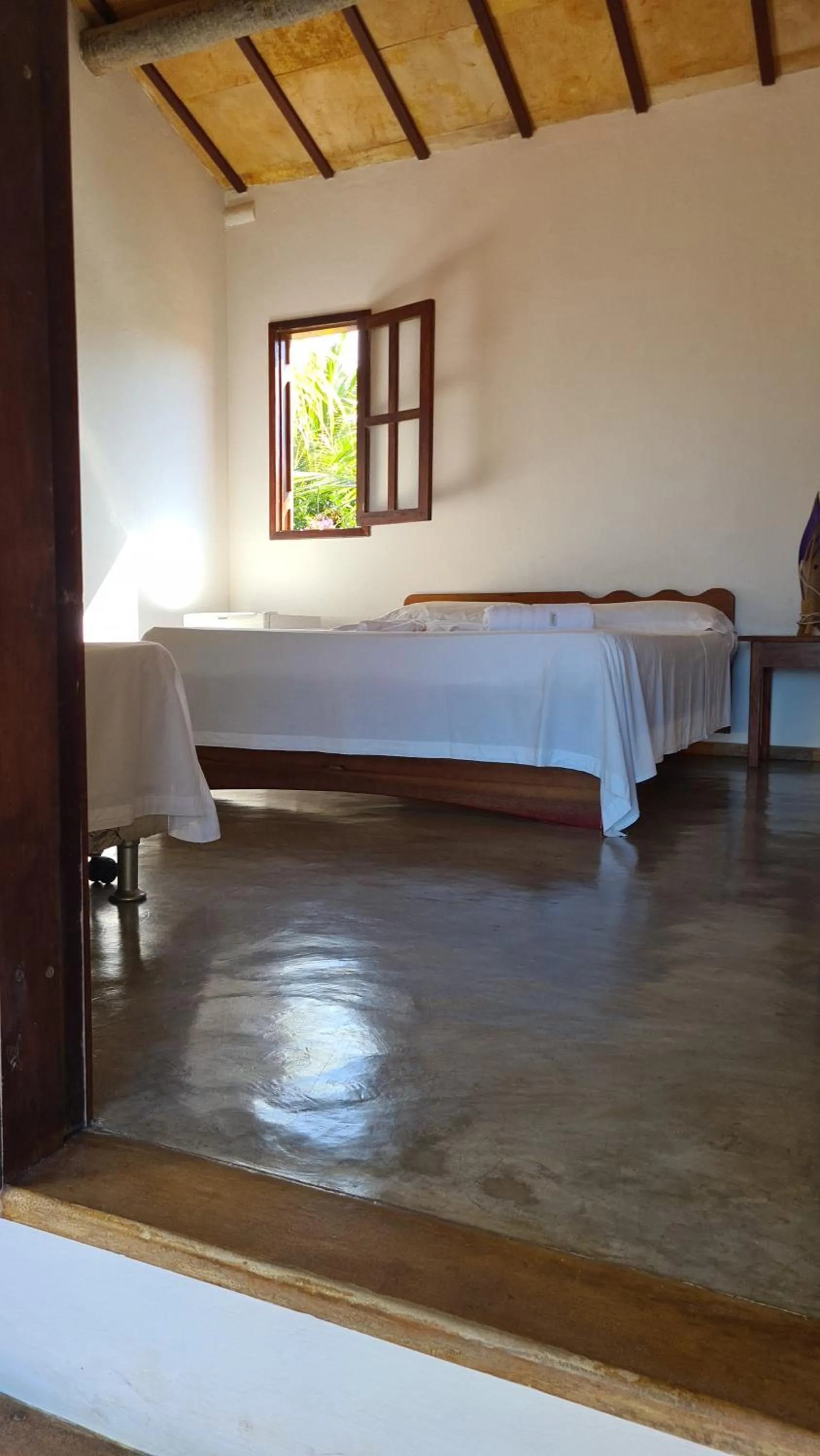 Bed in Pousada Agua Marinha